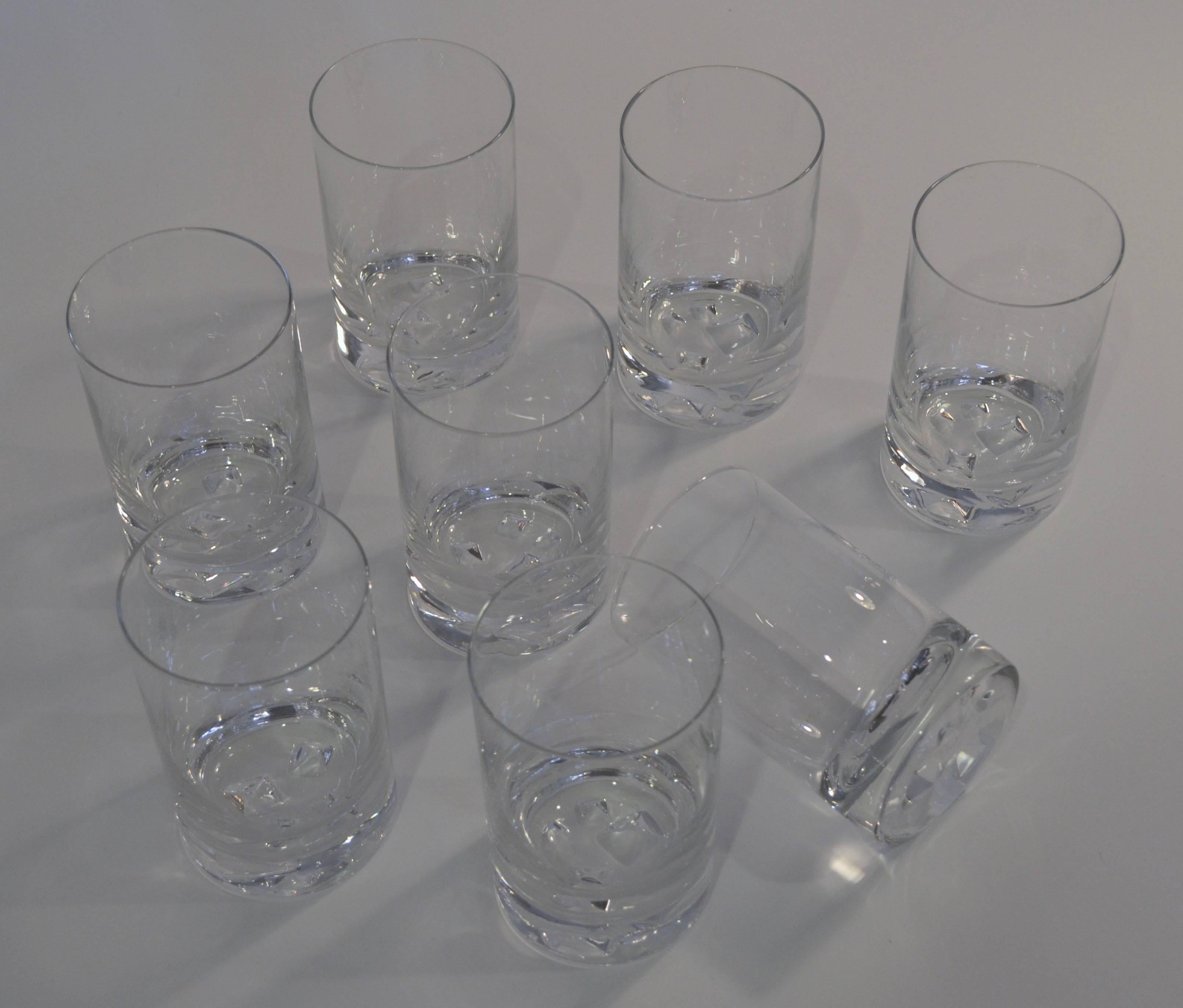 Tapio Wirkkala used ice Formations and water flow as his inspiration for his "IceBreaker" glassware for Iittala circa 1960s. They are made of turned mold-blown clear glass. This series has a heavy bottom with four ice block sculptures