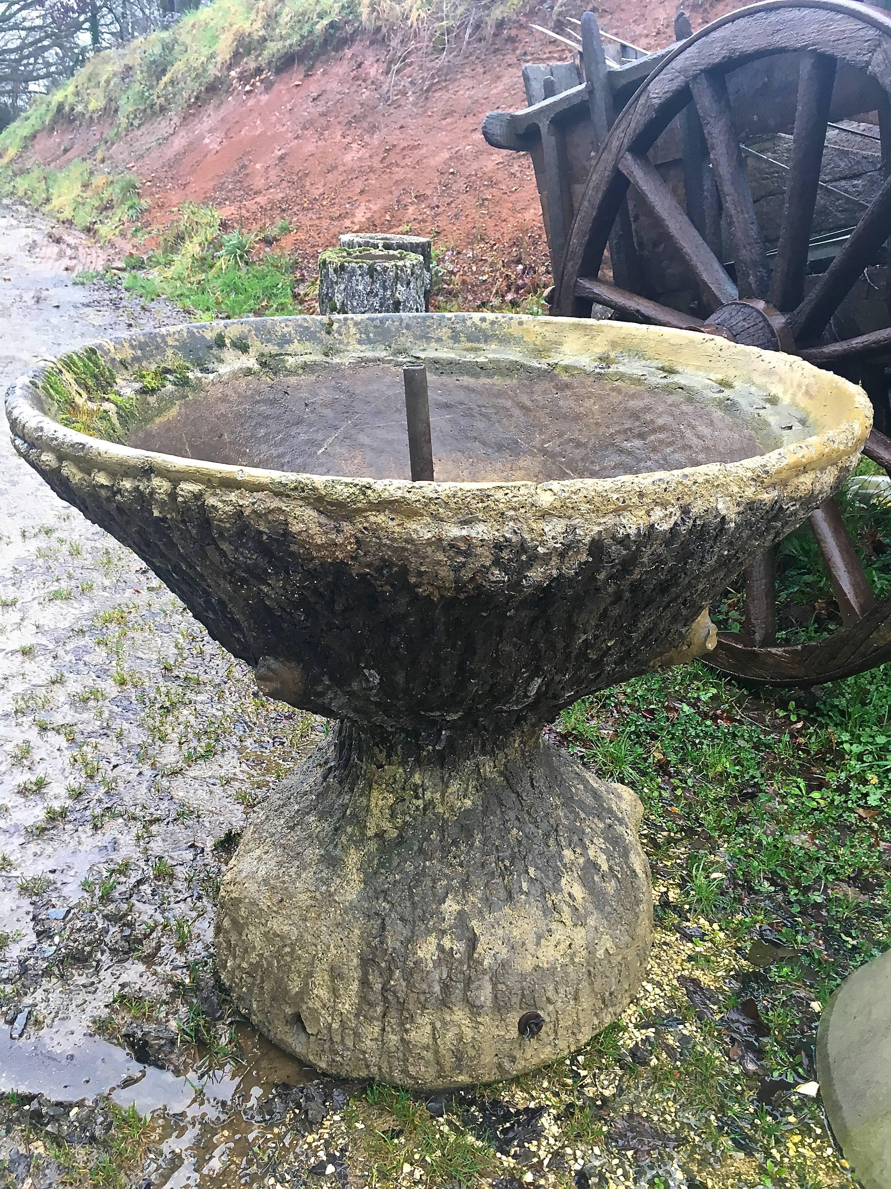 This fabulous faux bois fountain (all one piece) came from a private garden in the east of France and ticks all of our boxes. Medium in size, with extraordinary patina and bits of moss at the edge of the bowl, it has a large fountain well with