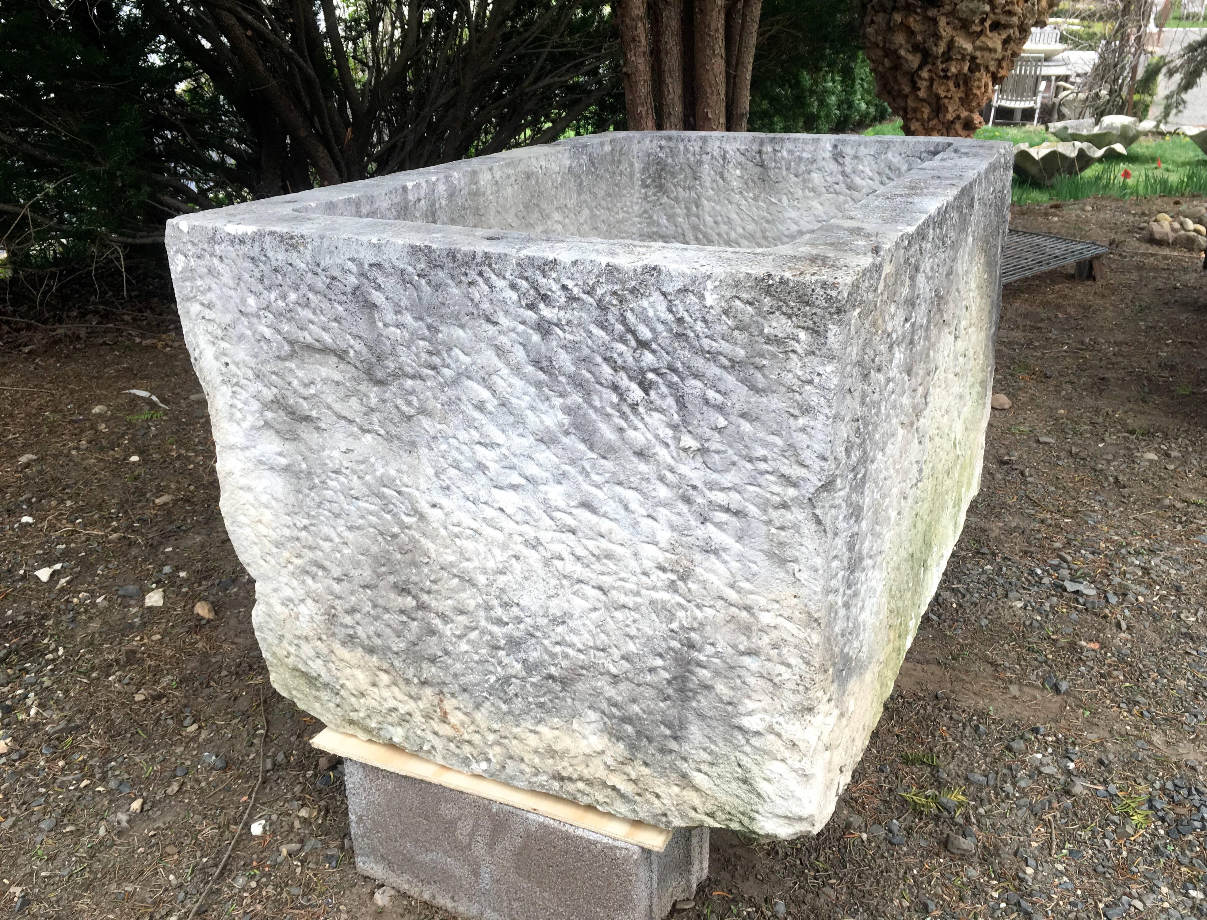 This lovely French carved limestone trough is the perfect size for a water feature or impressive planter in your garden. In immaculate condition, with only a single well-weathered chip to one corner, it would be stunning as a wall fountain with a