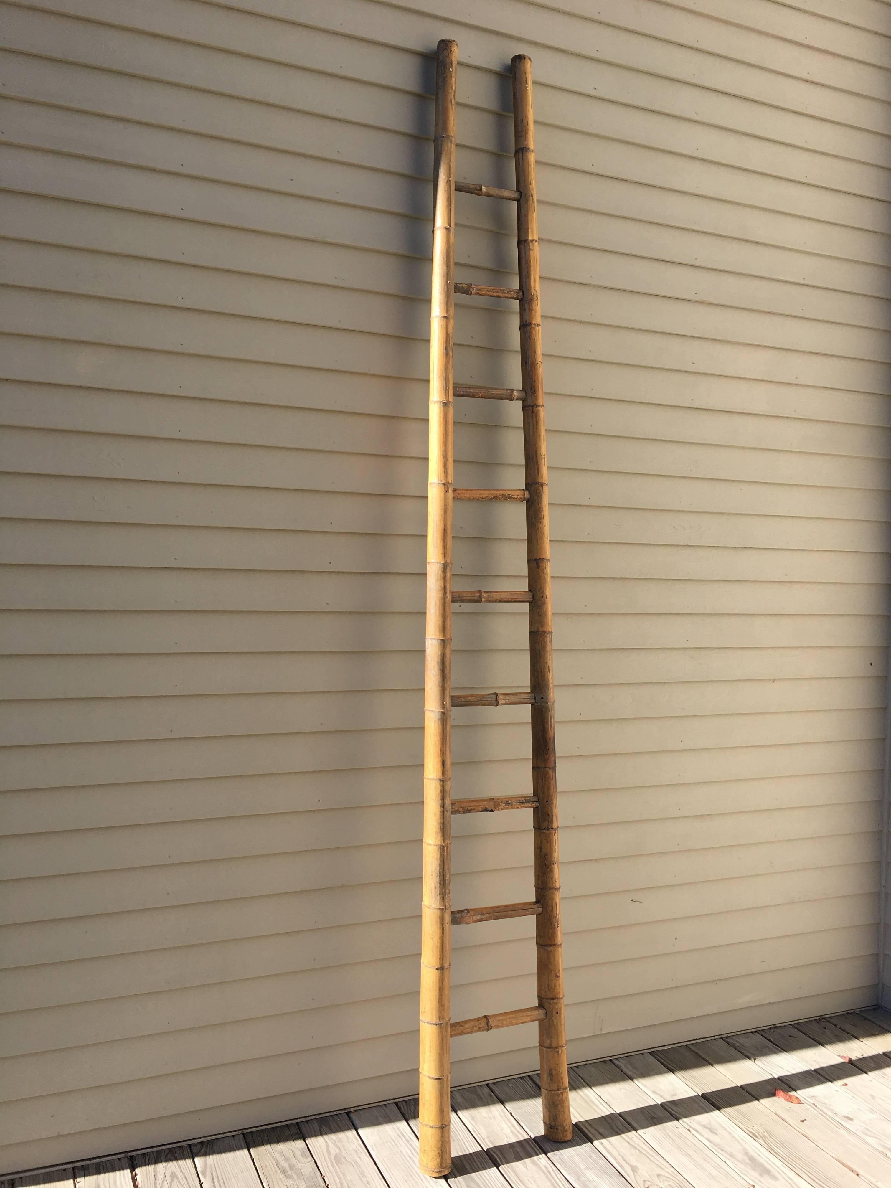 What a beauty! This very tall handmade bamboo ladder is in the form of an orchard ladder and may have been used for that purpose, but could also be a display piece. Use it as an accent piece in a bathroom to hold towels and if your ceilings aren't