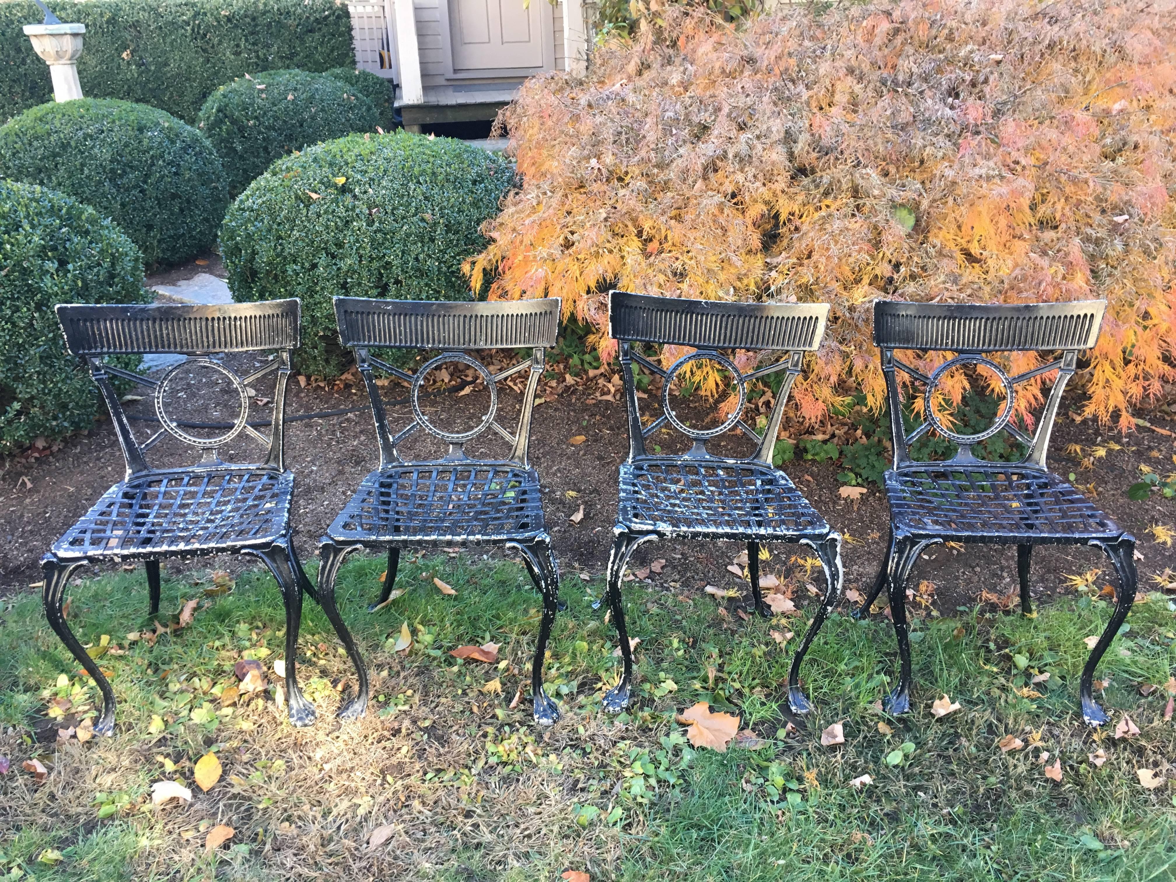 What a find! We scored 16 of these decorative Klismos-style chairs in chippy black paint. Extremely comfortable, even without cushions, they can be left as is, sandblasted and clear-coated for a dark silver finish or repainted to your custom