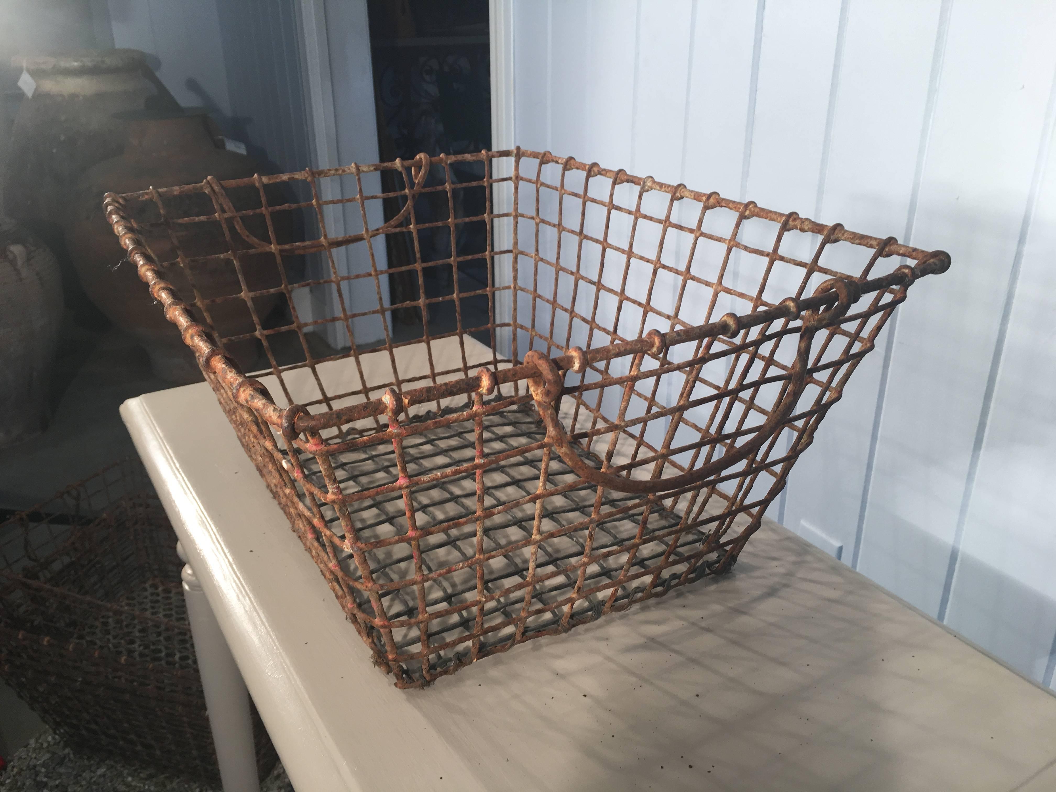 We found these rusty iron oyster baskets in Bordeaux, close to the Arcachon basin, renowned for its oysters. We originally had six, but three have sold so now only three remain. They all stack for easy storage, although we think they would be great