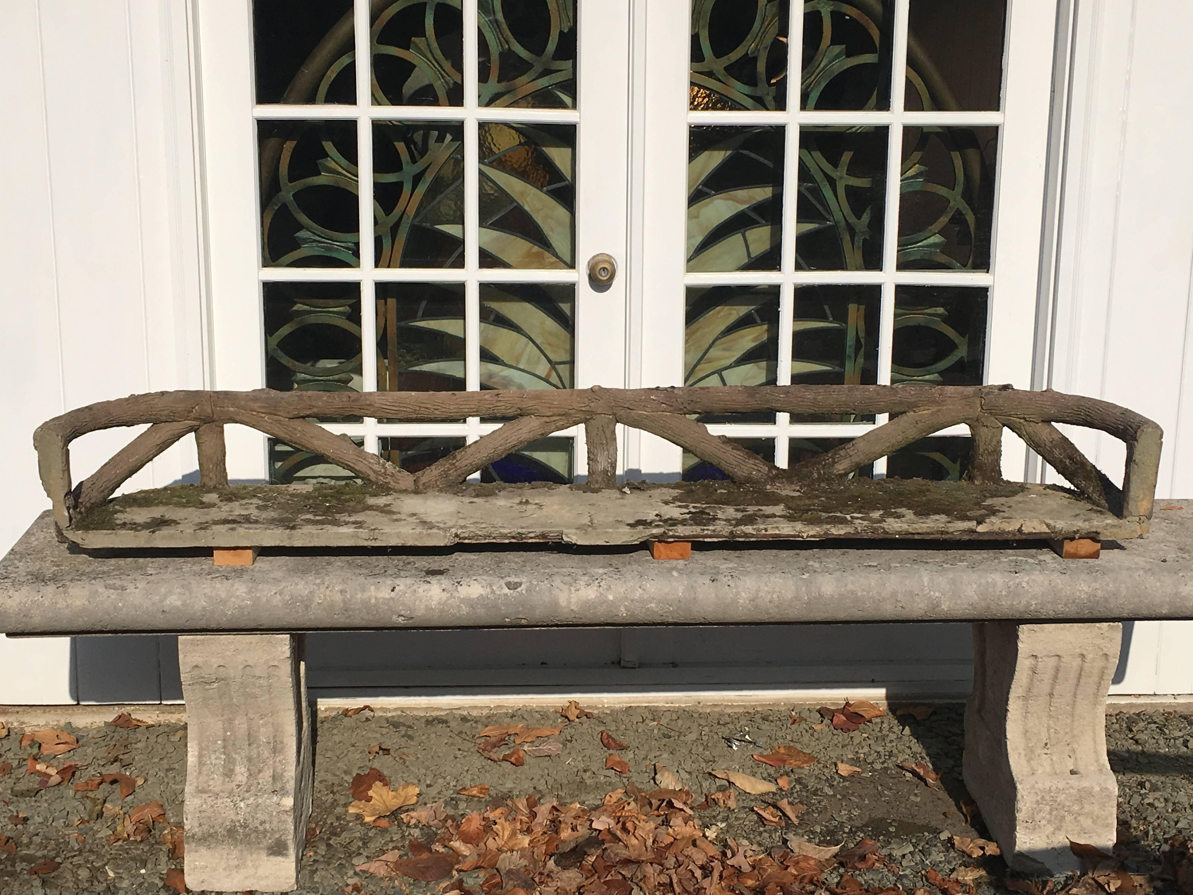 What a rare find! This long three-sided faux bois balcony originally fronted a pair of French doors and has its original bottom and three sides. Perfect as a decorative piece to hold flower pots, or get more creative and use it as a fireplace