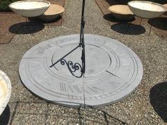 Six Foot Diameter English Cast Stone Sundial with Scrolled Gnomon