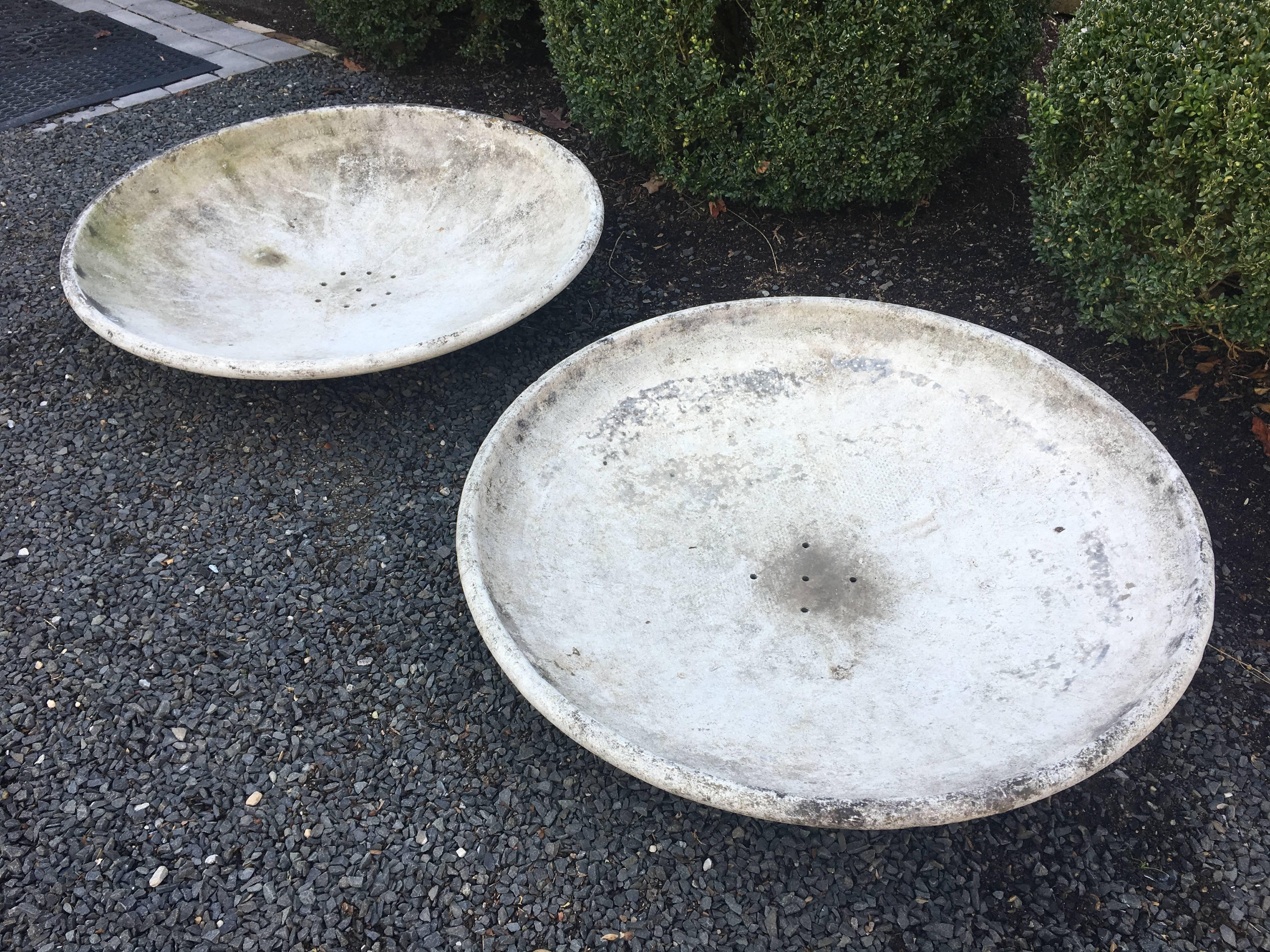 This great pair of fiber cement saucer planters was designed by the iconic Willy Guhl and manufactured by Eternit, SA of Switzerland in the 1950s. They would be perfect flanking the entrance to a beach house or contemporary garden filled with wavy