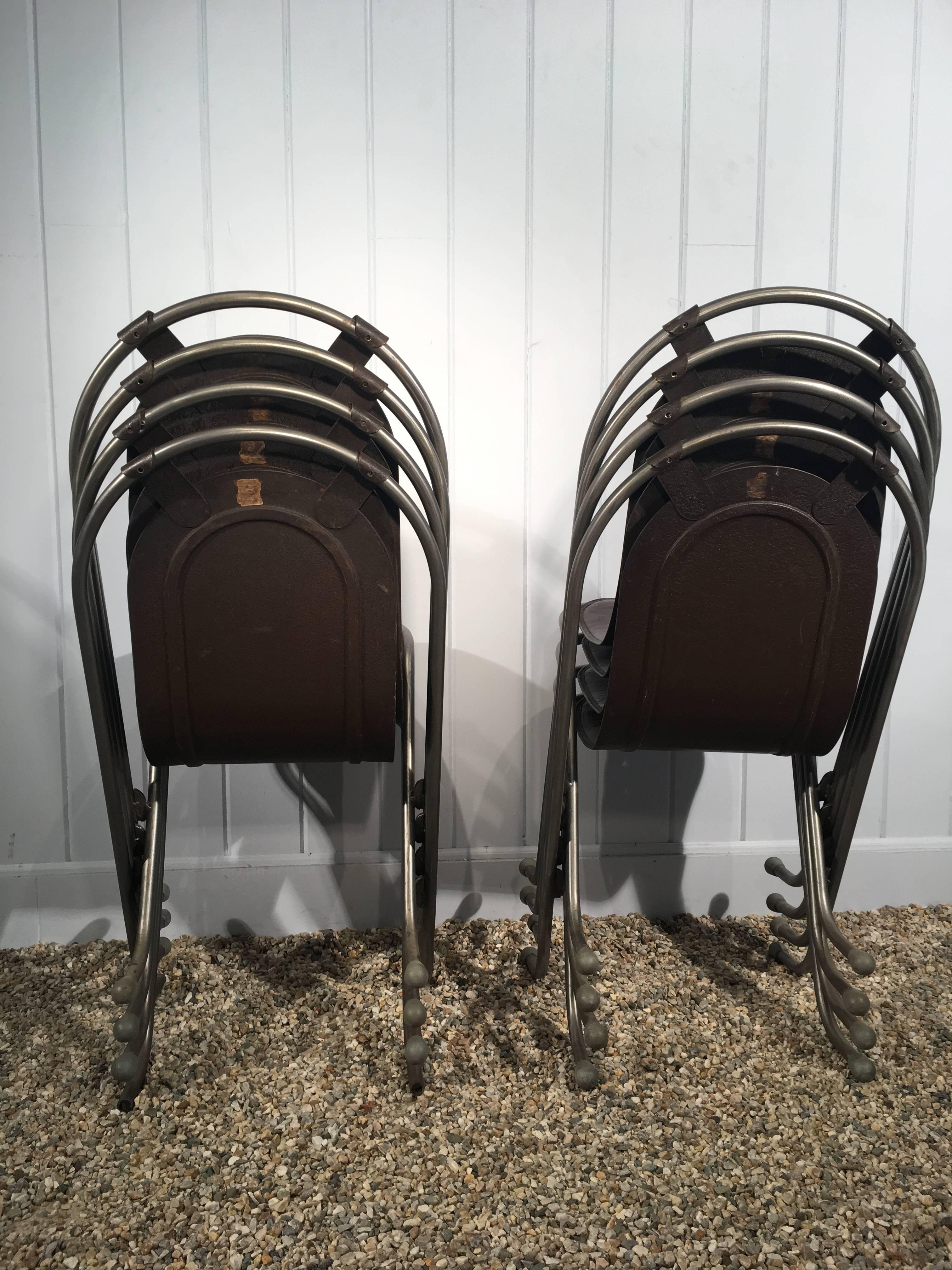 Mid-Century Modern Set of Eight Steel Stak-A-Bye Chairs with Original Naugahyde Seats For Sale