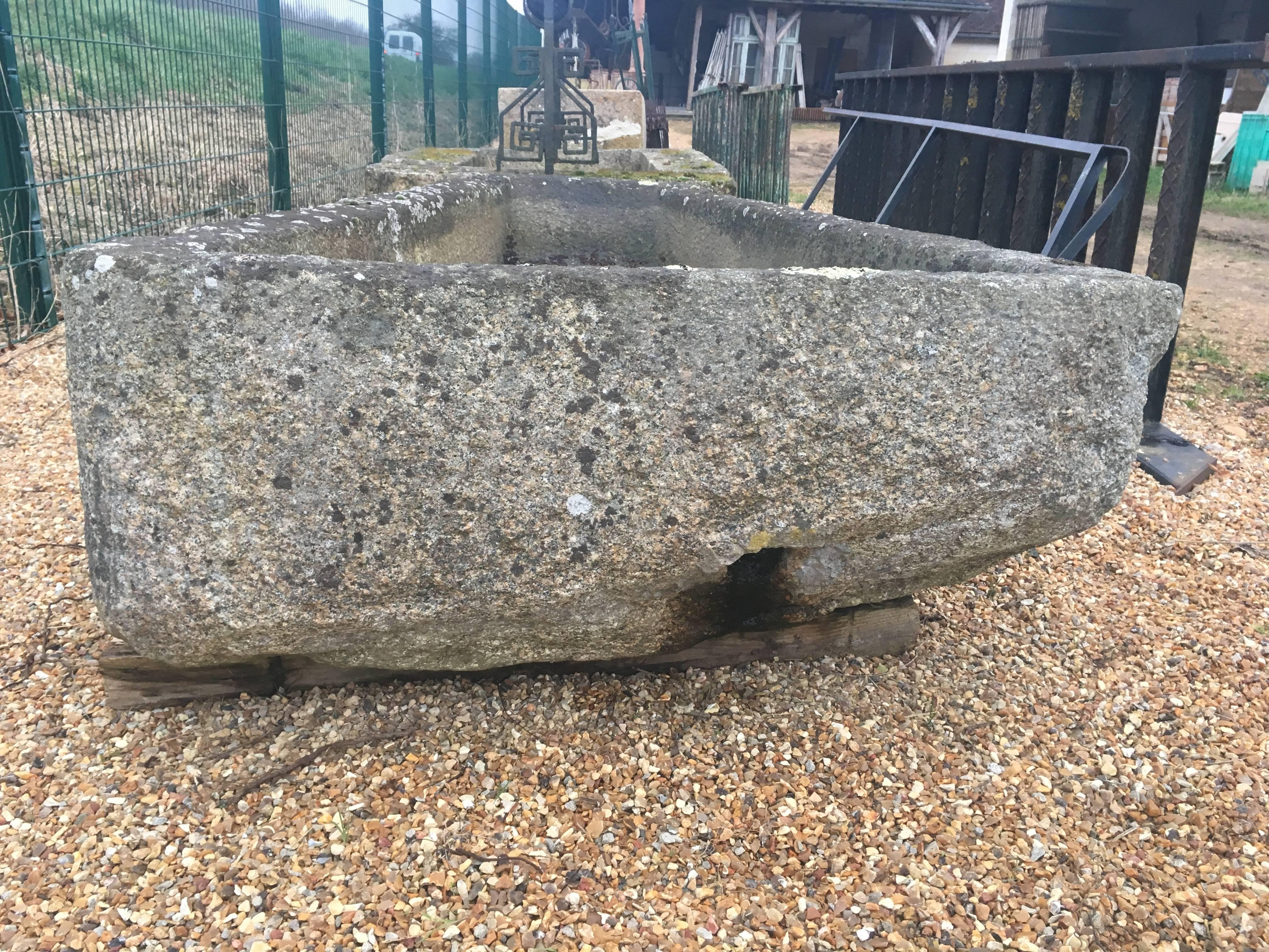 Hand-Carved 15th Century French Keystone-Shaped Granite Lavoir or Trough For Sale