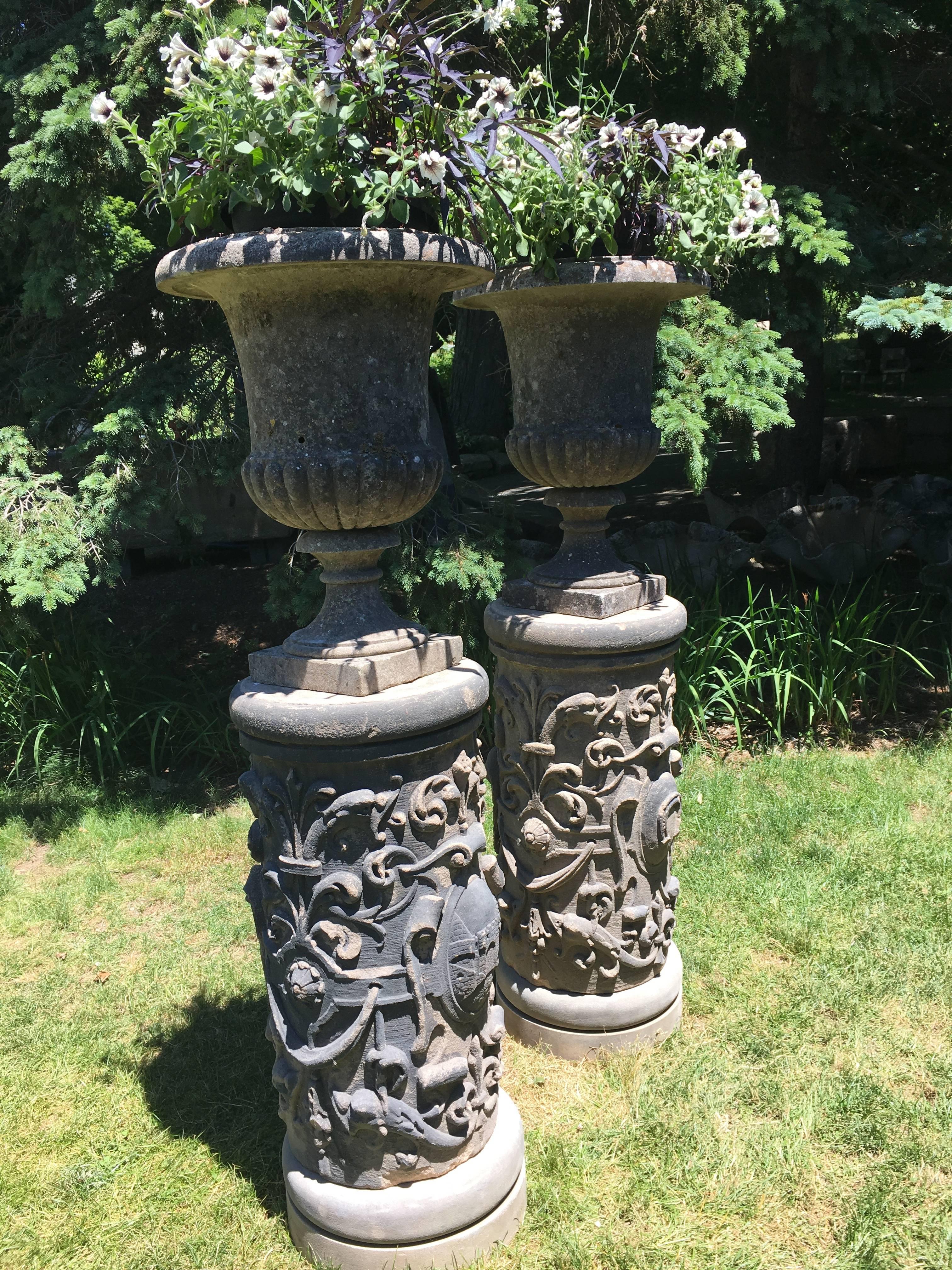 The gorgeous weathered surface of these large classic campana-form urns belies their true age, but only you will be the wiser. Beautiful lichen and mossy bits cover the surface and they have very deep planting wells, so can handle even the most