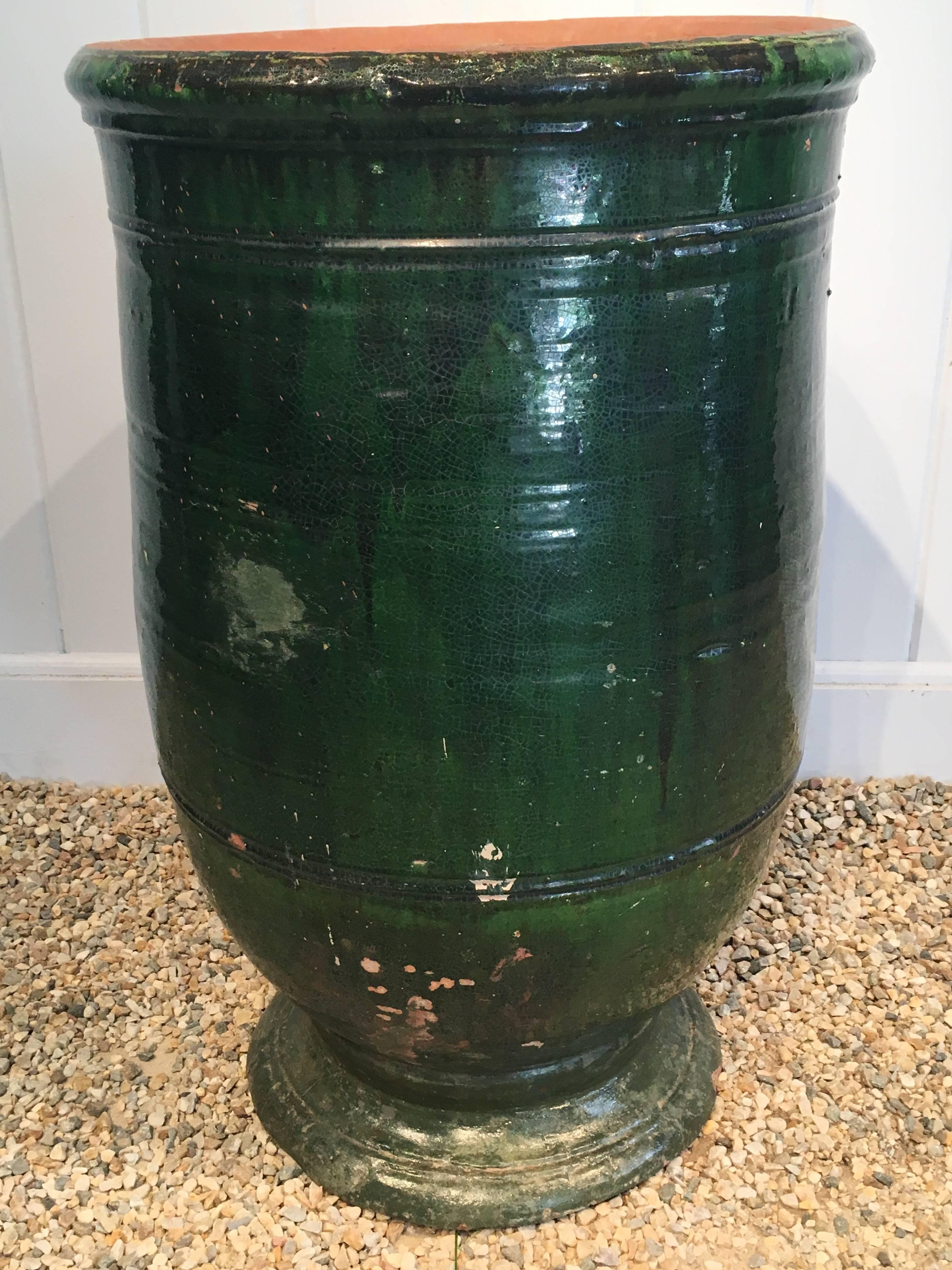 This beauty comes from Apt in the Provence region of France and has the most stunning dark emerald green colored glaze. In marvelous condition, it has a small chip to the foot (shown in photo #9) and a small repair to the foot. Because it is glazed