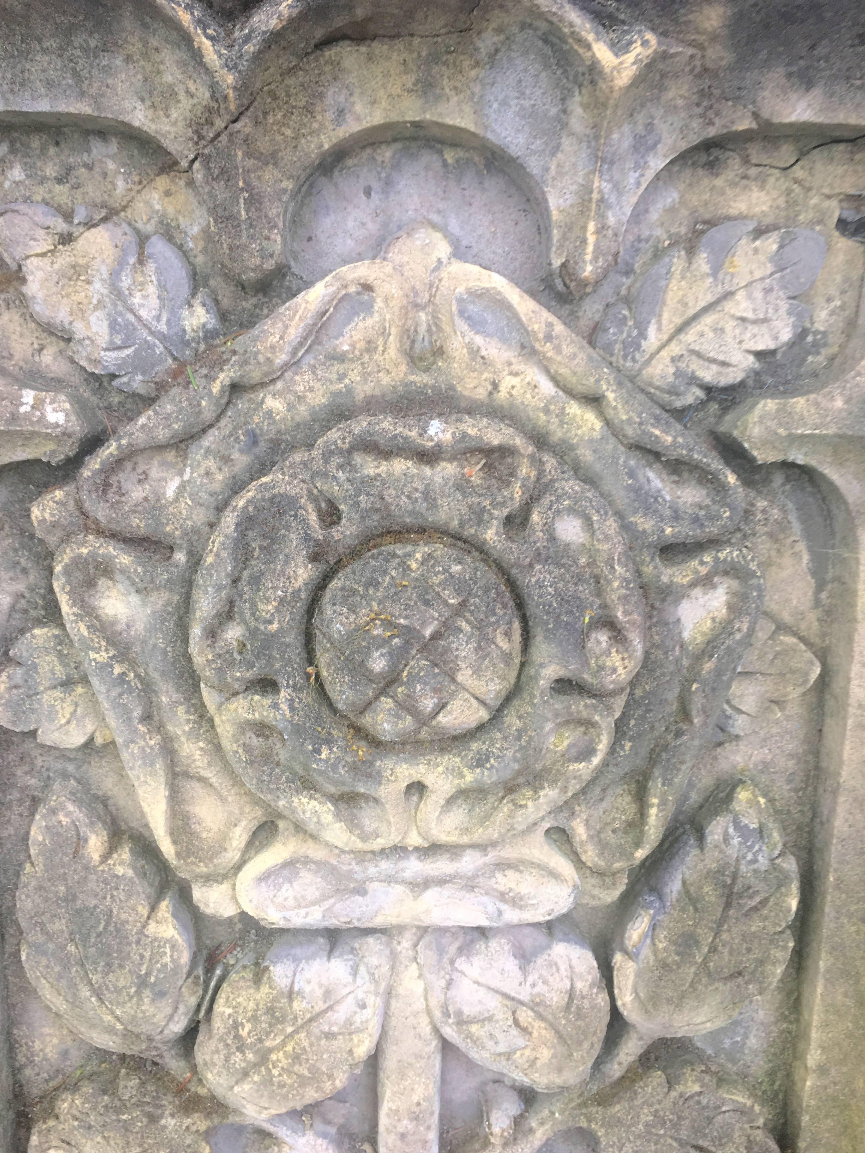 These fabulous and very large hand-carved sandstone plaques depict the heraldic symbols of the Houses of York and Lancaster (the War of the Roses). In overall good antique condition, with old iron repairs to the sides and a few cracks, they are