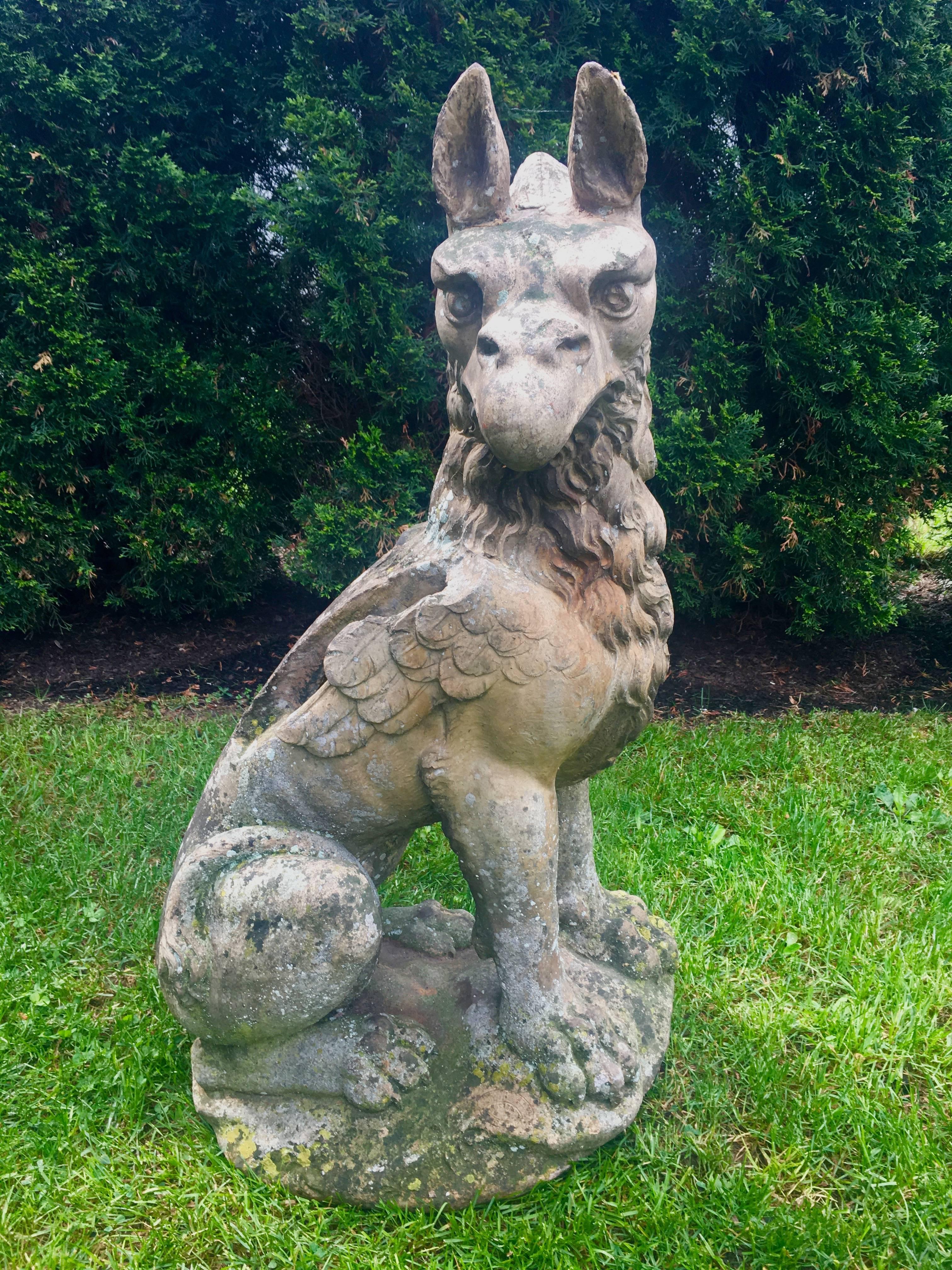 This magnificent and rare terracotta griffin was crafted by the famous firm of Giscard in Toulouse and dates to circa 1860. Giscard was known for the highest quality terracotta monuments, statuary, and facades made especially for the public