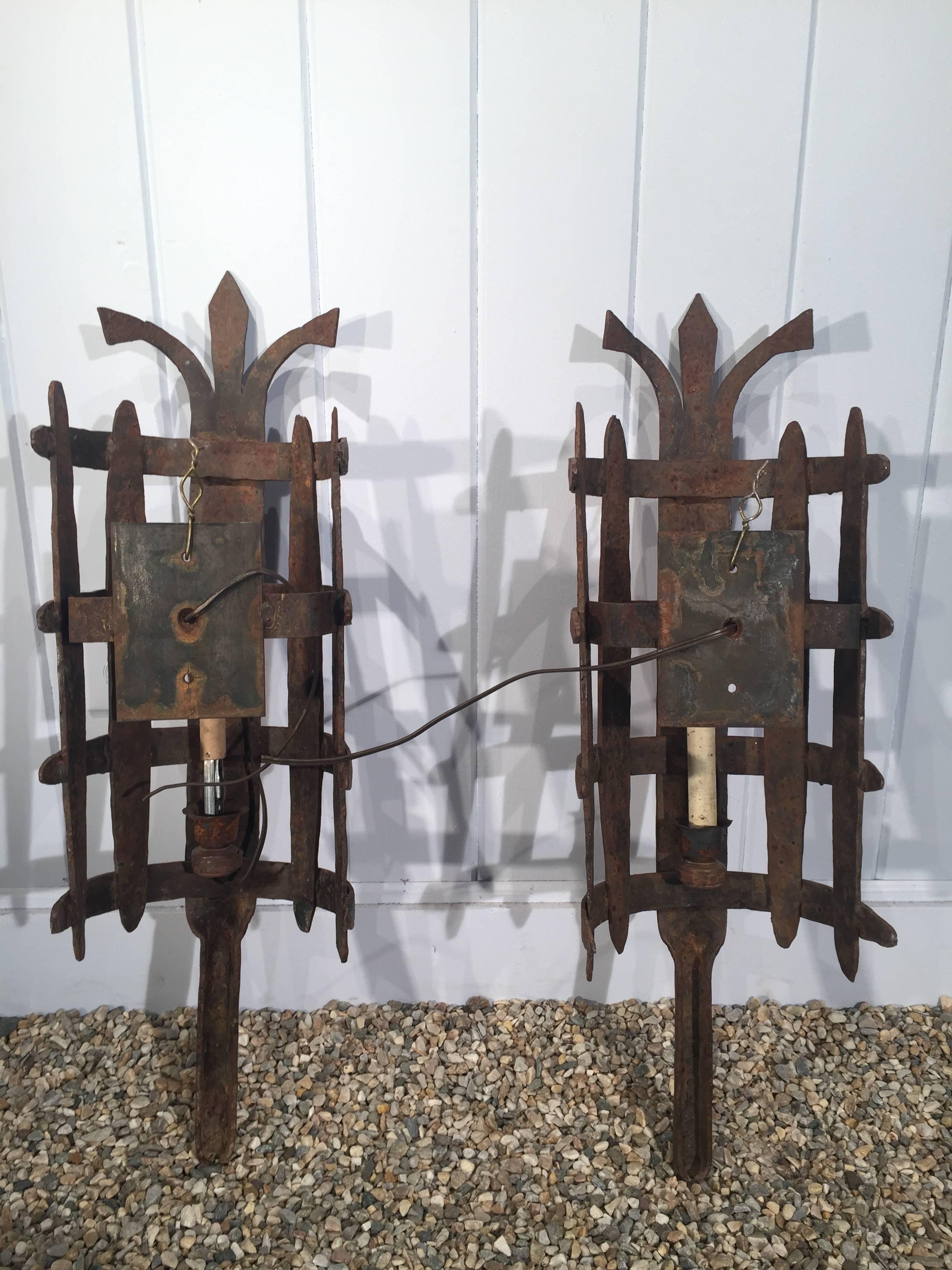 Large Pair of French Wrought Iron Medieval-Style Sconces In Good Condition For Sale In Woodbury, CT