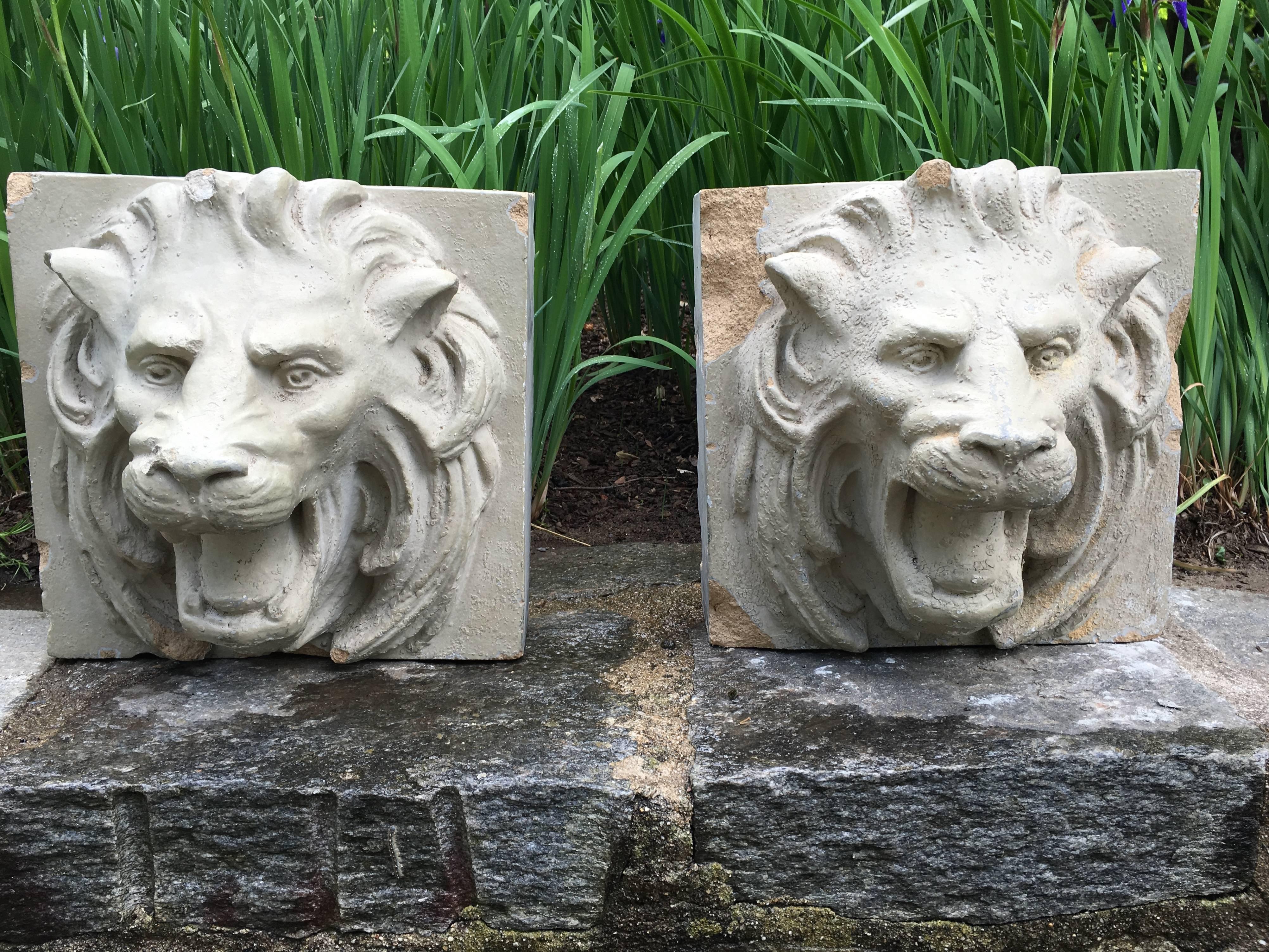 This decorative pair of glazed stoneware lion heads originally graced the facade of a 19th century building, but we have drilled them to operate as fountain masks. Hung above your wall fountain or emptying into a stone trough they add a classical