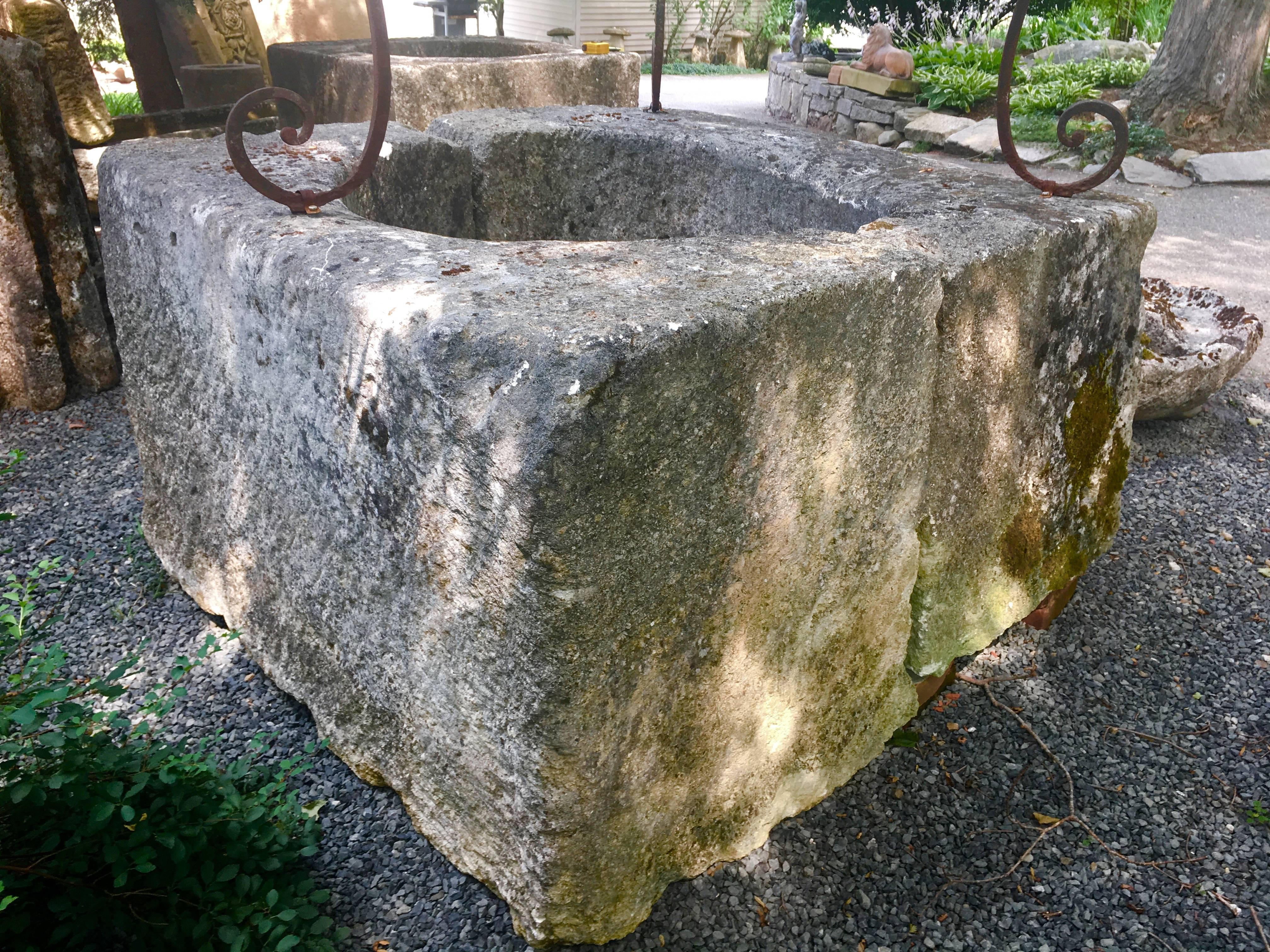 Monumental 18th Century French Limestone Wellhead with Overthrow In Excellent Condition In Woodbury, CT