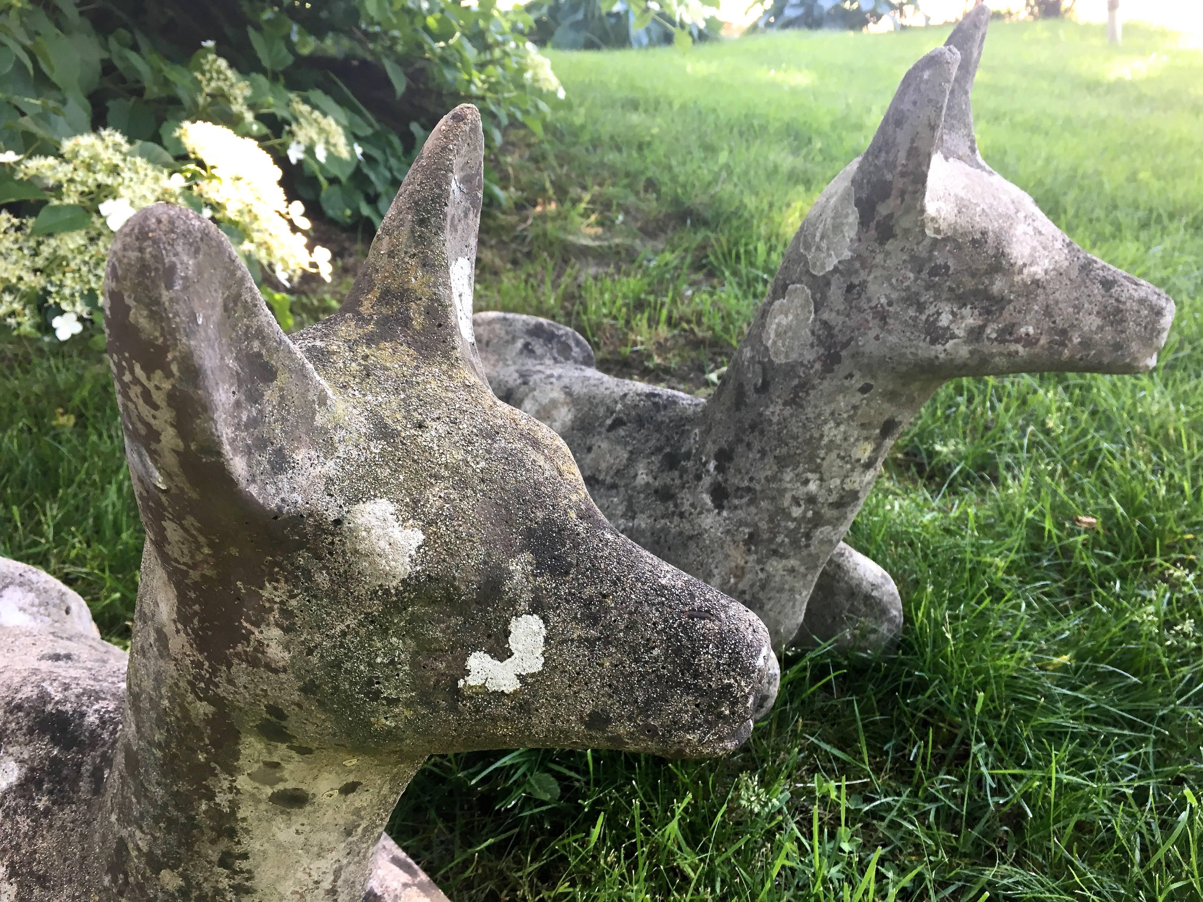 20th Century Two French Cast Stone Recumbent Deer