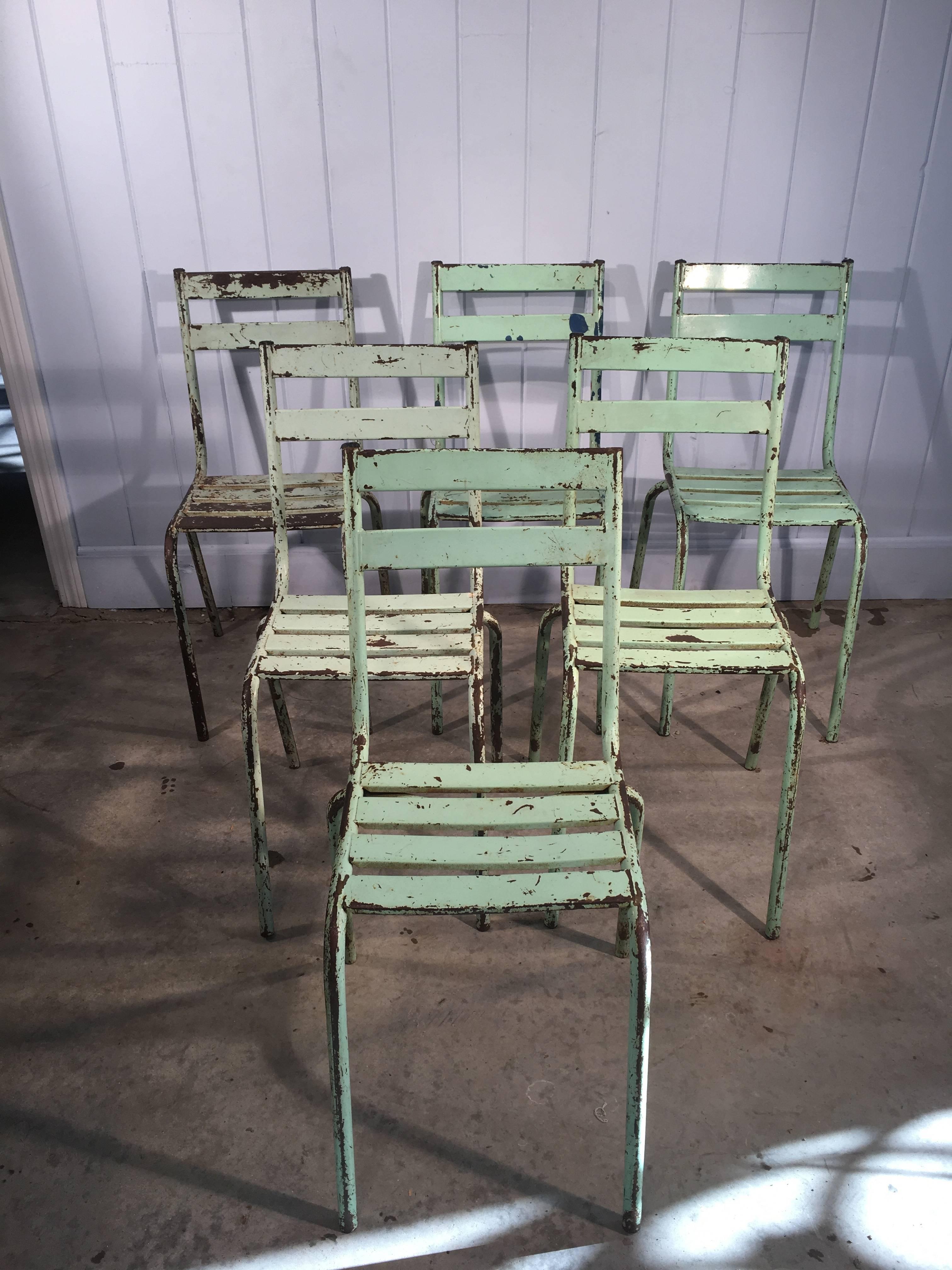 We love these sturdy steel garden chairs with their mixed patina of green paint and a bit of rust. Their clean lines work with everything and they are so comfortable. They also stack, so take up very little room should you choose to store them when