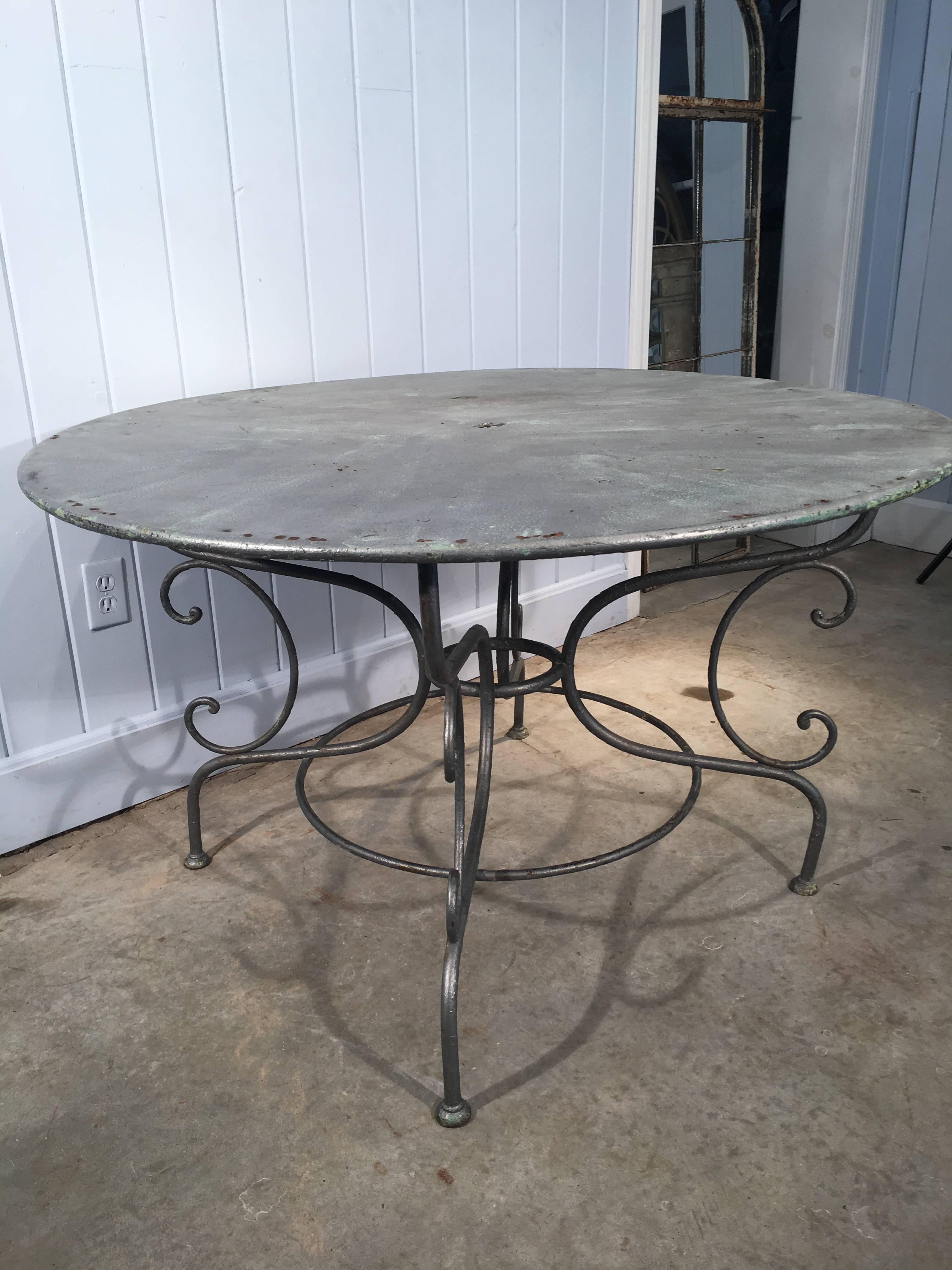 French Wrought Iron Round Dining Table with Scrolled Base In Excellent Condition In Woodbury, CT