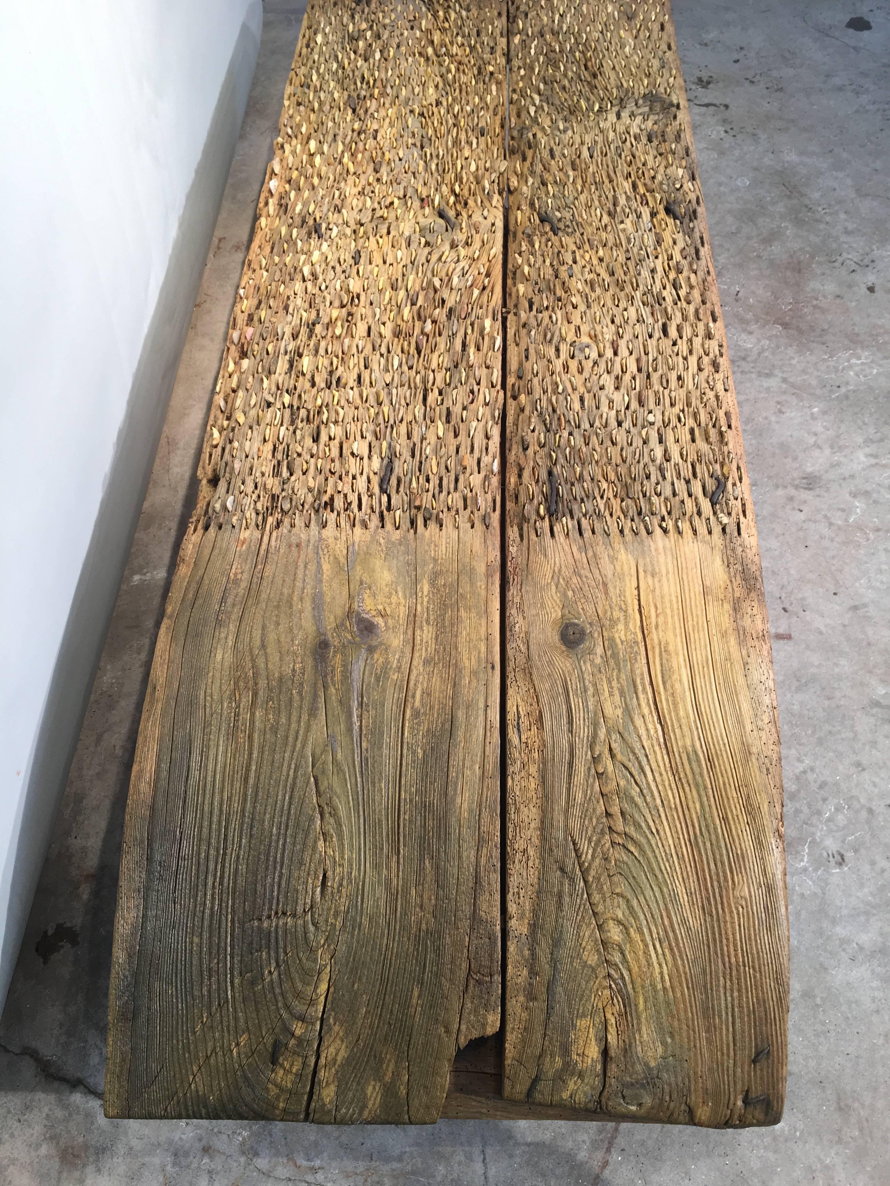 Rustic Unusual Coffee Table Made from a 200 Year-Old Honey-Brown Tribulum For Sale