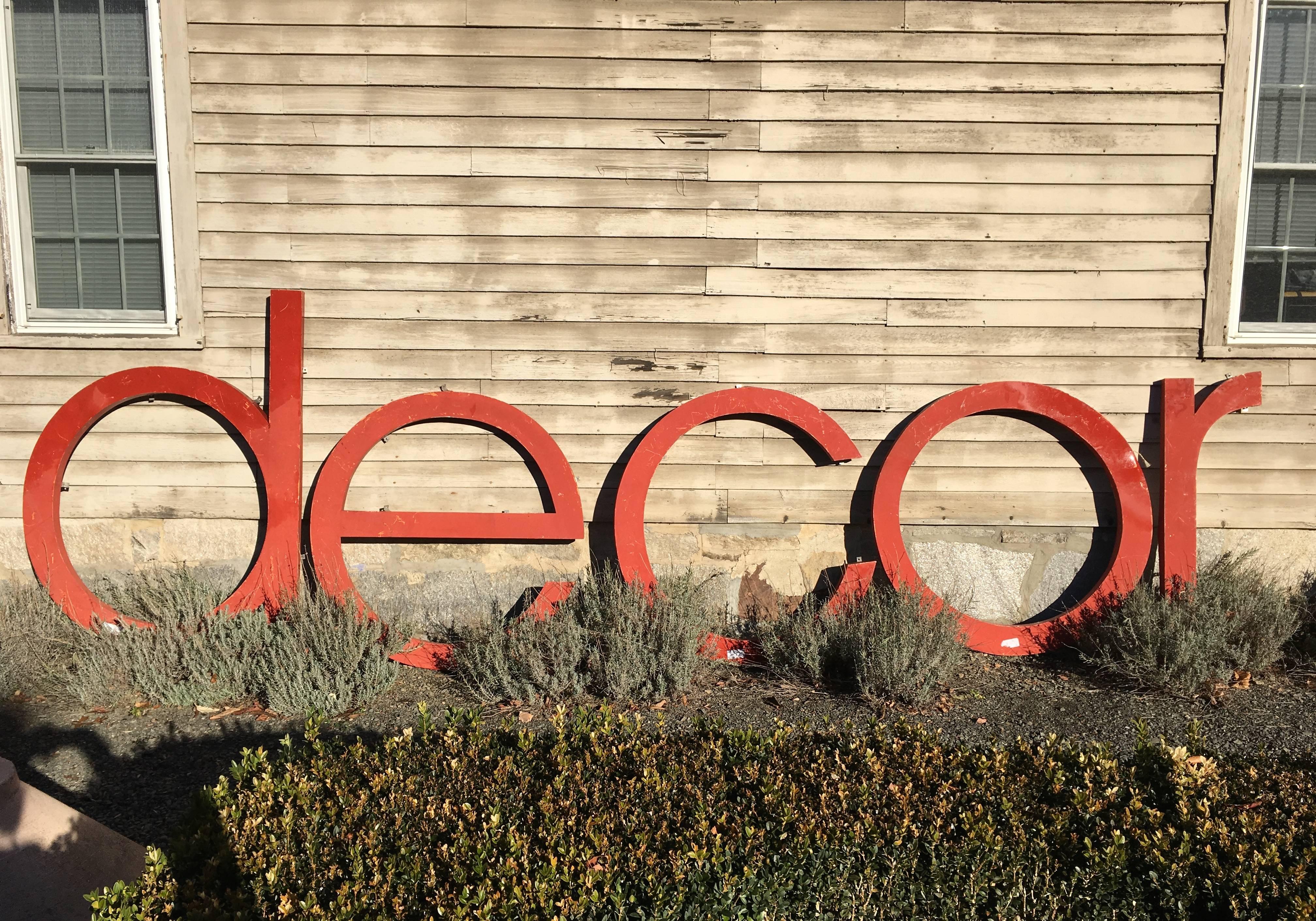 We sourced these amazing letters in Provence and thought they'd be the perfect find for a shop or business specializing in Design and Decoration. Made of aluminum, they are in excellent condition and originally had very faded red paint, but we