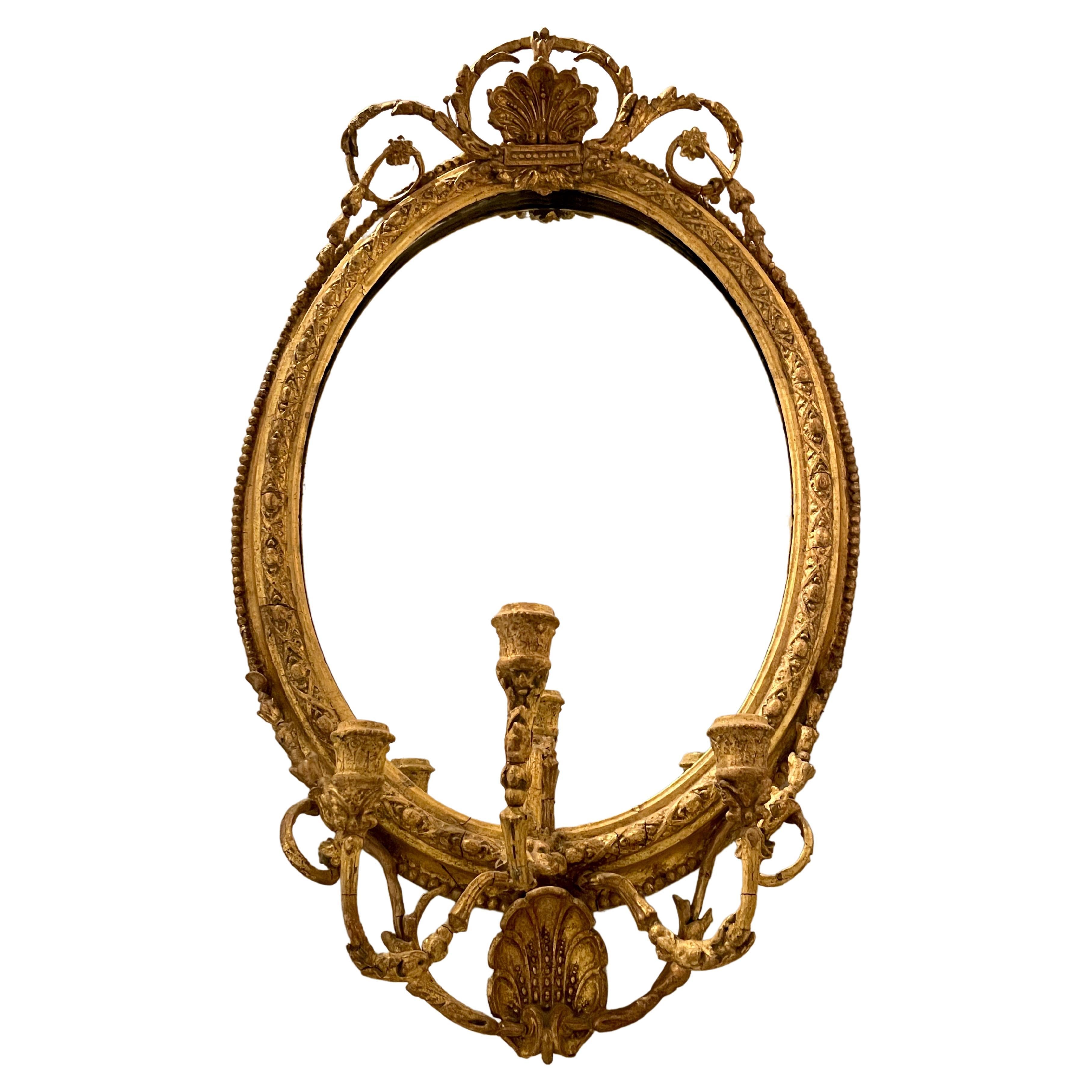 18th Century Gilded Oval Girandole Mirror with Triple Candelabra For Sale