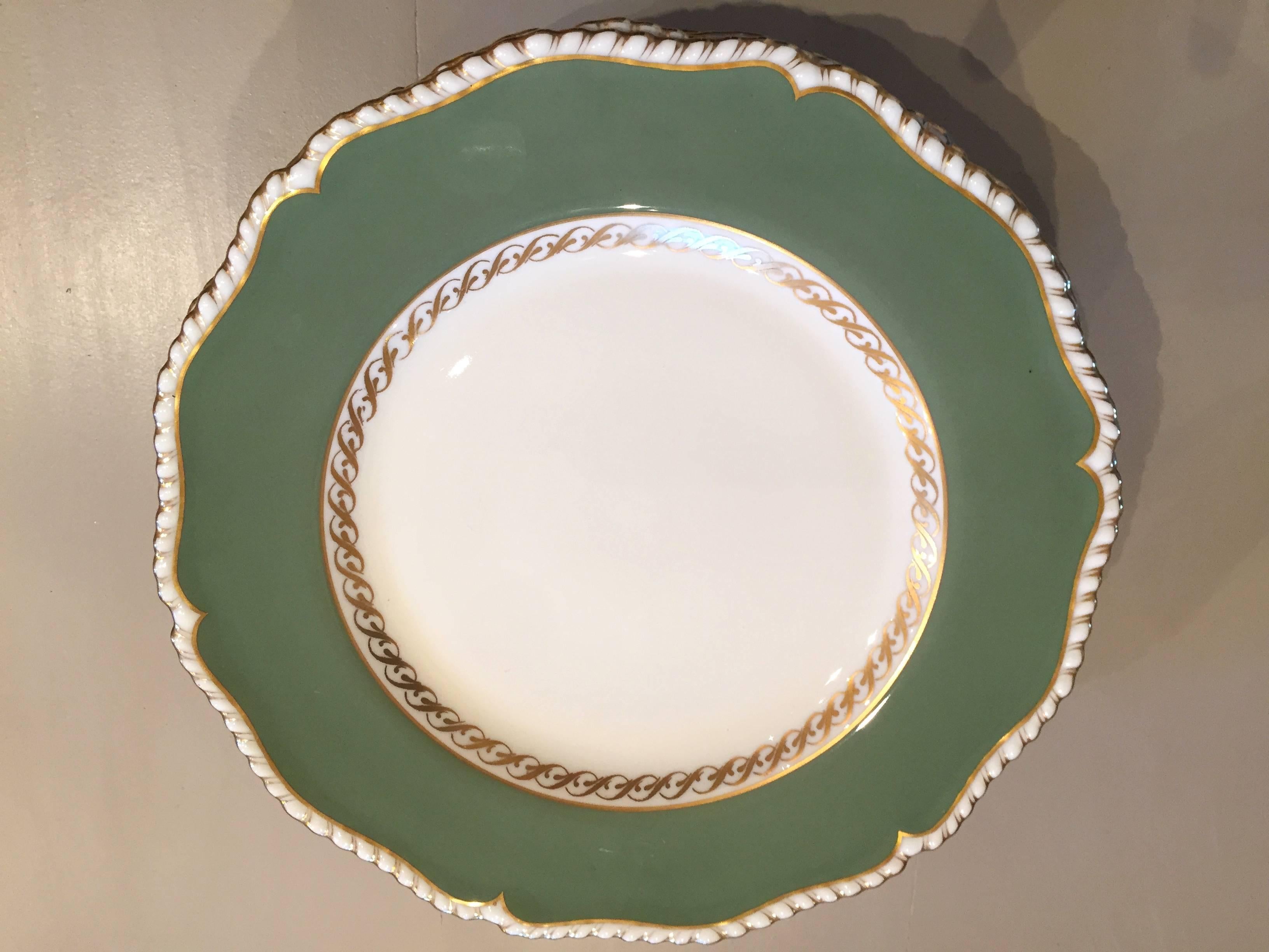 What a beautiful and versatile set of dinner plates or chargers for your holiday table! These beauties are dated 1952 on the reverse, along with the Royal Worcester mark, and are all in perfect, possibly unused, condition. The lovely dark sage green