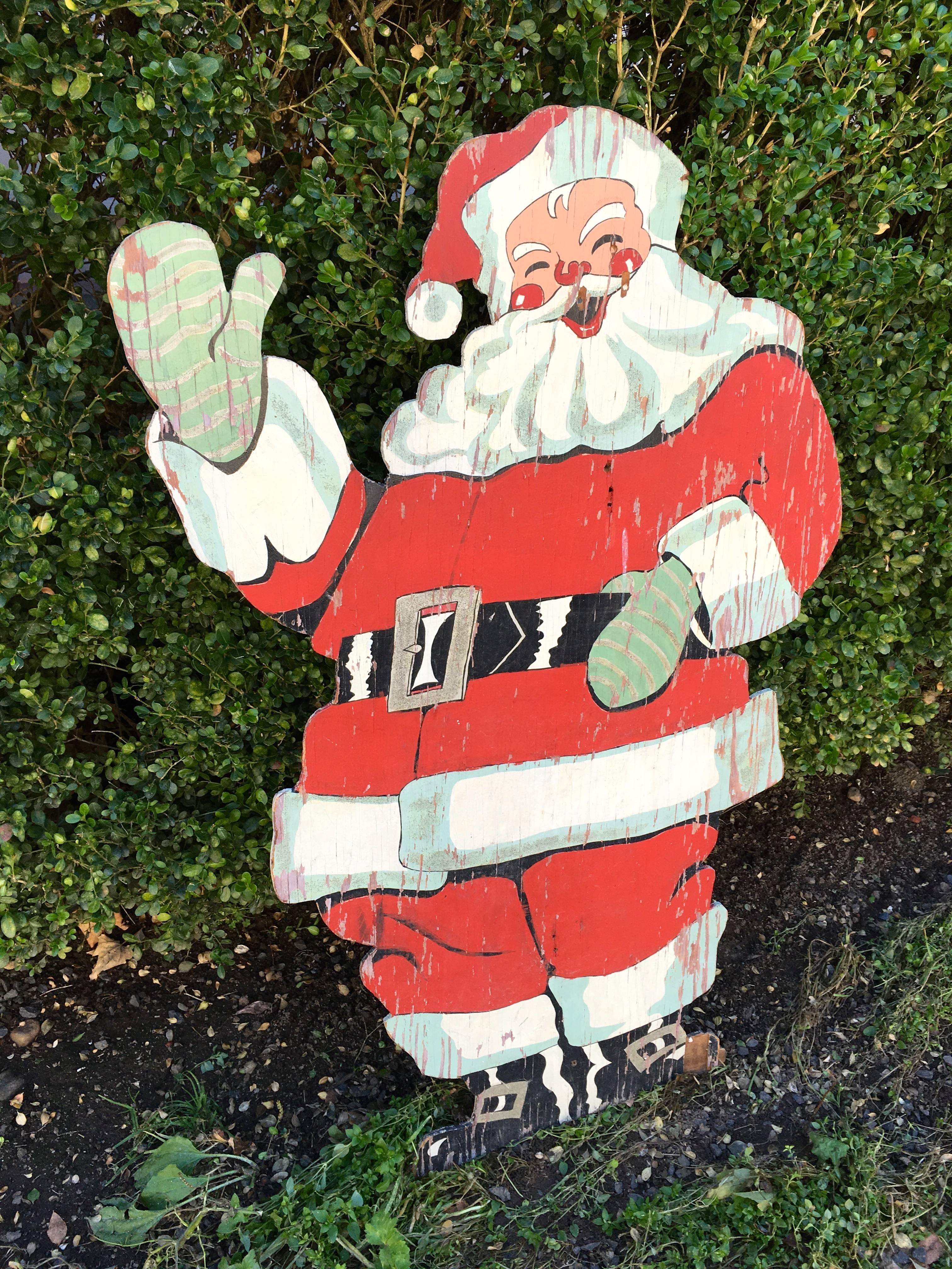 What a great addition to your holiday decorations! This jolly figure of St. Nick is hand-painted and would be perfect standing beside your Christmas tree or up against a decorative mantel surrounded by swags of green boughs. Currently, Santa needs