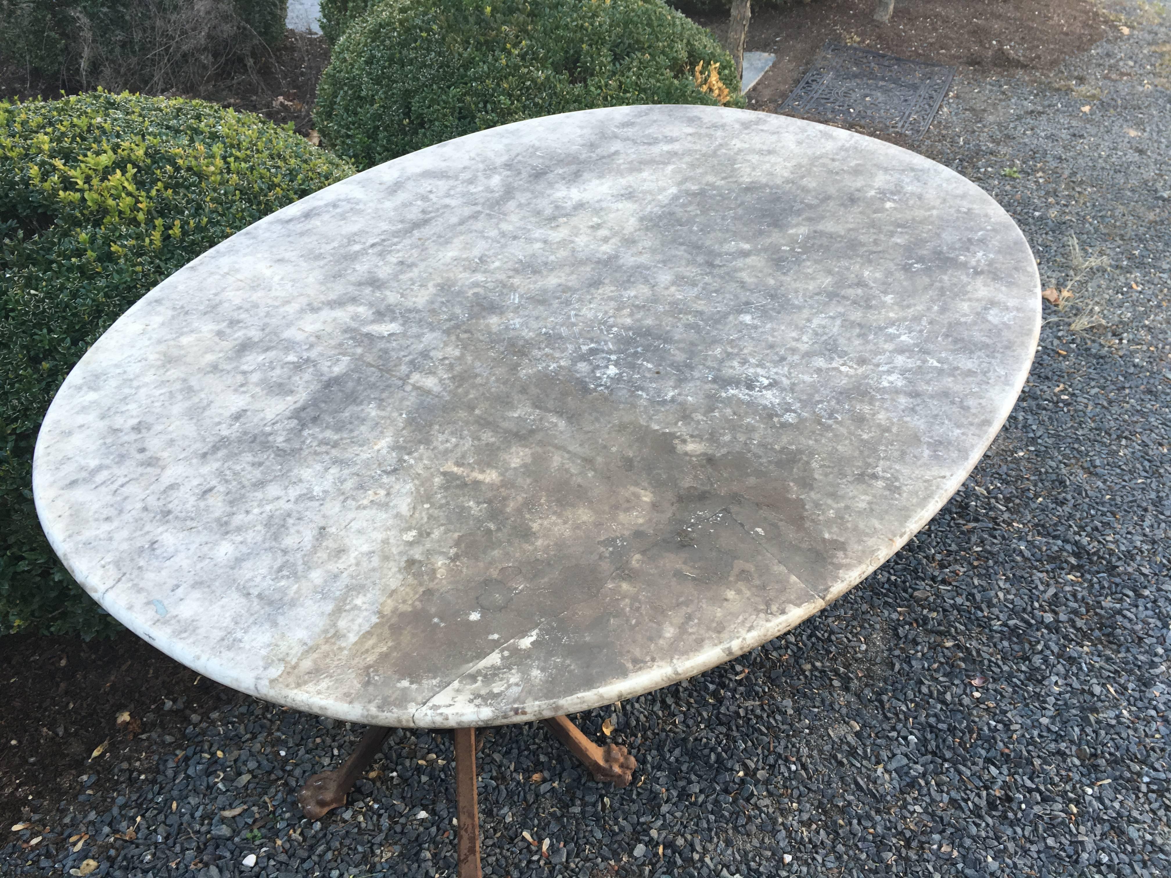 19th Century French Oval Marble Dining Table with Whimsical Iron Legs