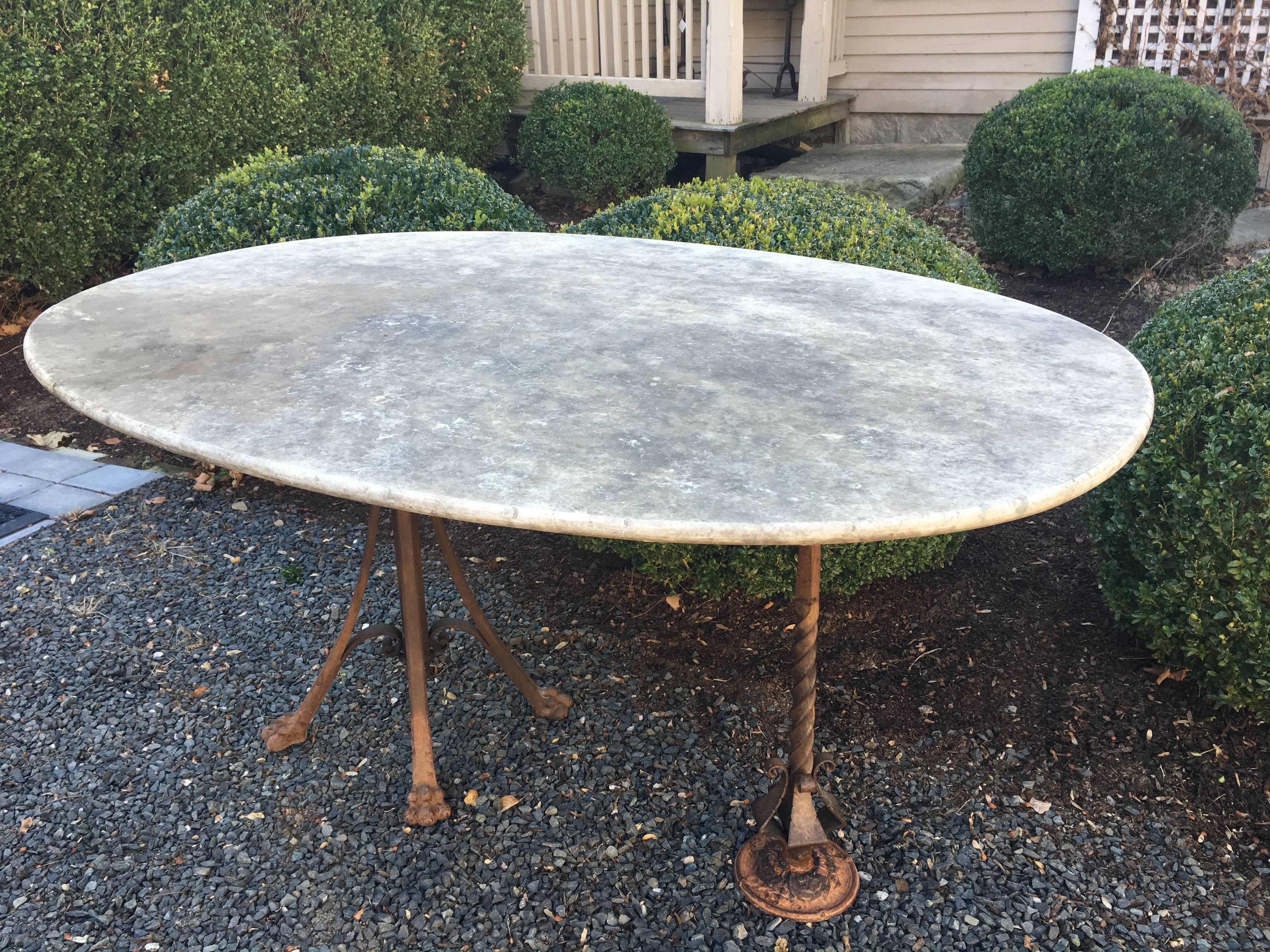 French Oval Marble Dining Table with Whimsical Iron Legs 1