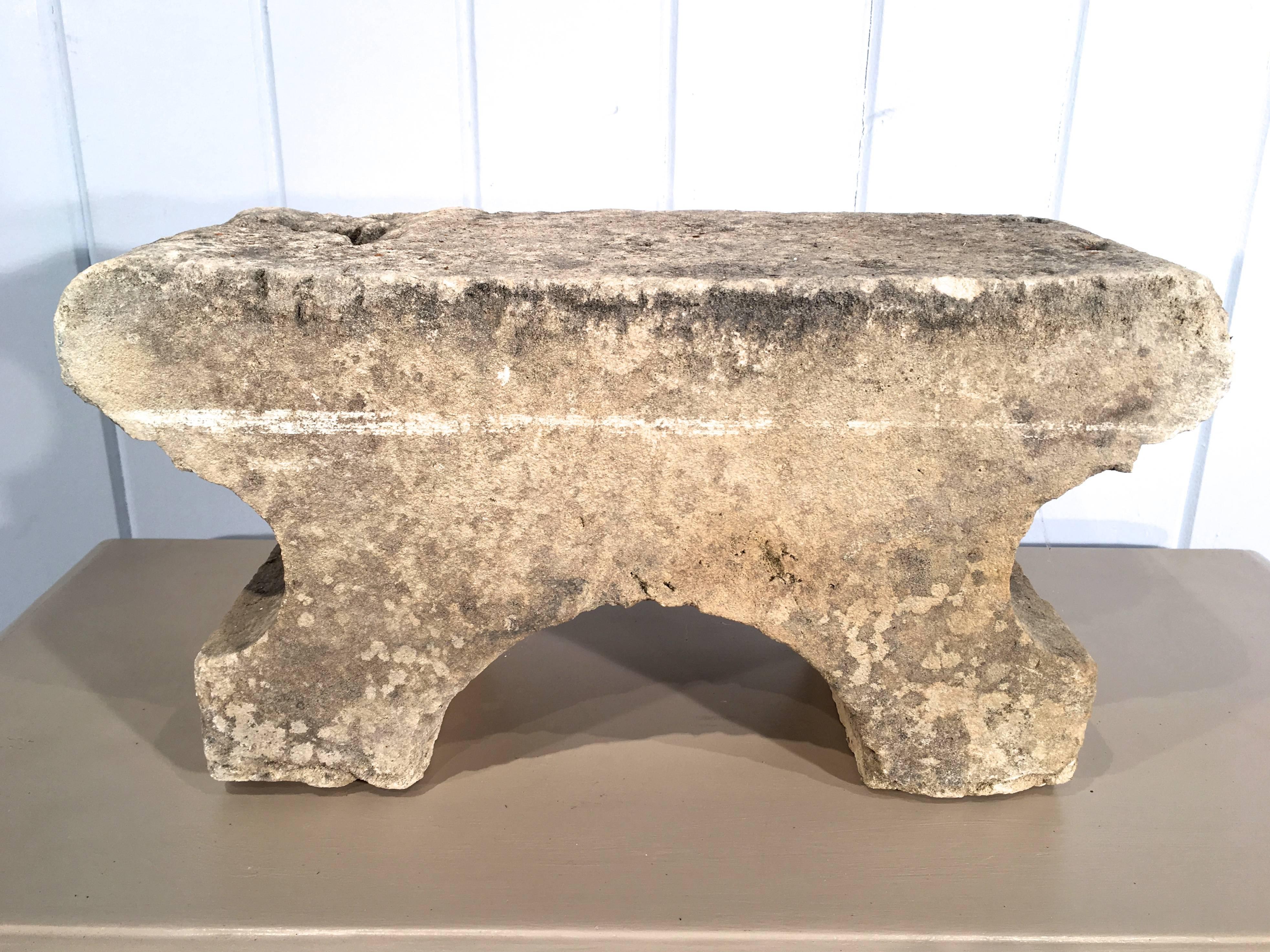 This charming, diminutive footstool was carved from limestone and originally used in French gardens to elevate flowerpots. We still think this is a good use, but you can mix it up a bit and use these on a table to elevate candles or serve fruit, or