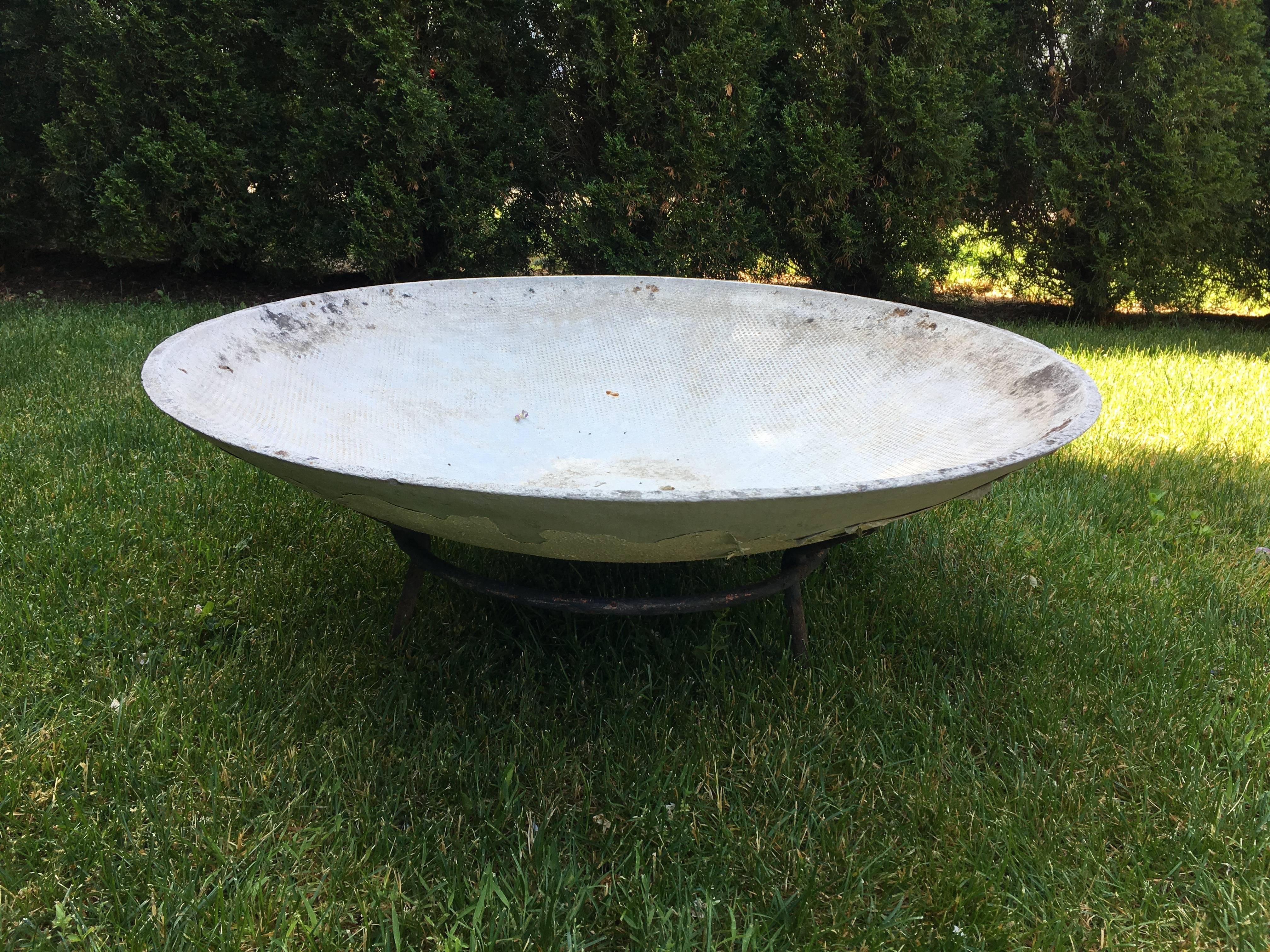 This classic Mid-Century Modern saucer planter in original iron stand is a bit smaller than the other five that we have, but works beautifully alone or in combination with our other saucer planters. Designed by the iconic Willy Guhl, numbered, and