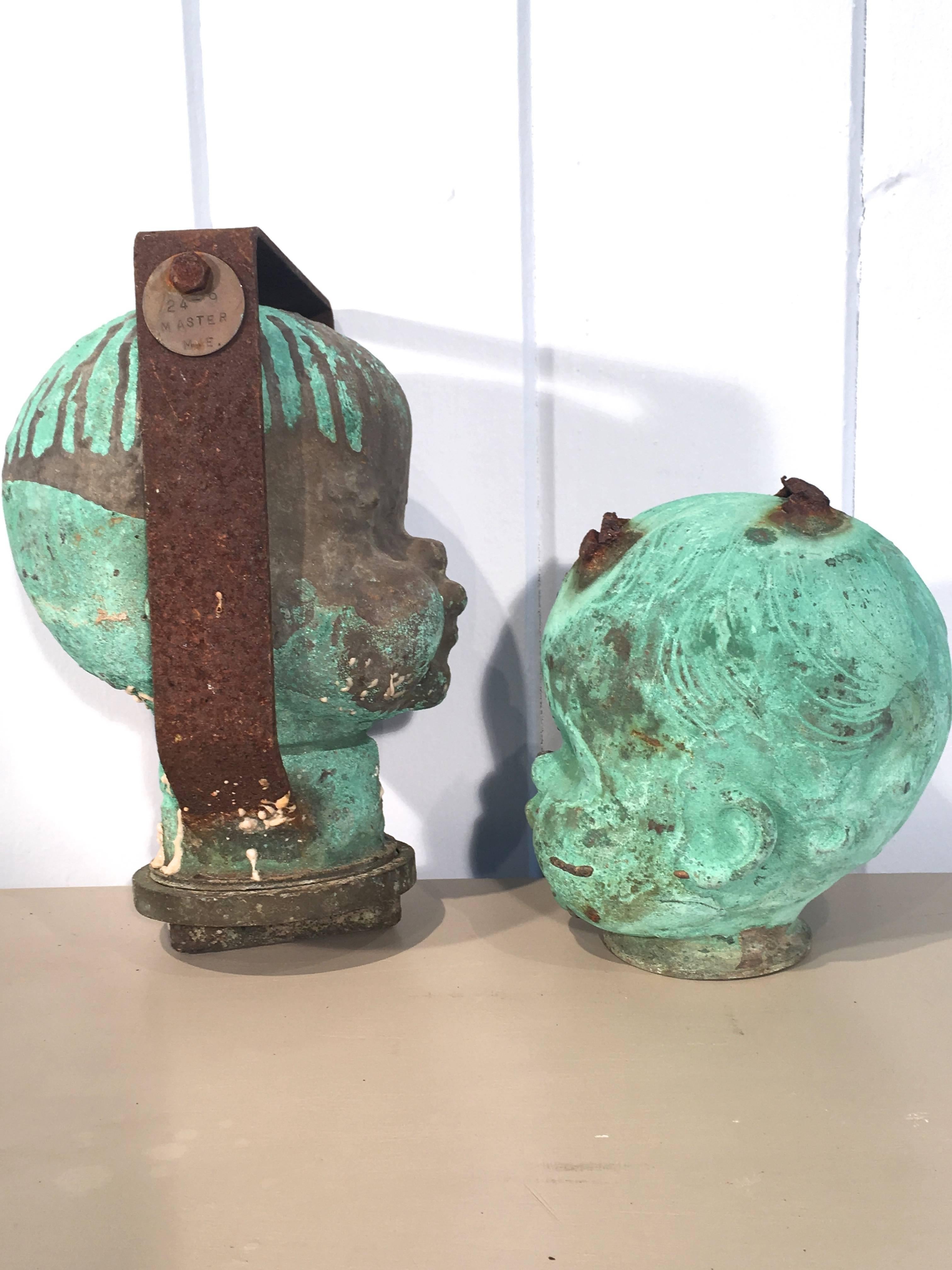 Certainly not our usual fare, but definitely a statement! We have two of these remaining from a collection of natural verdigris bronze doll head molds from a defunct factory in Falls River, MA. We have thought of lighting them from within and