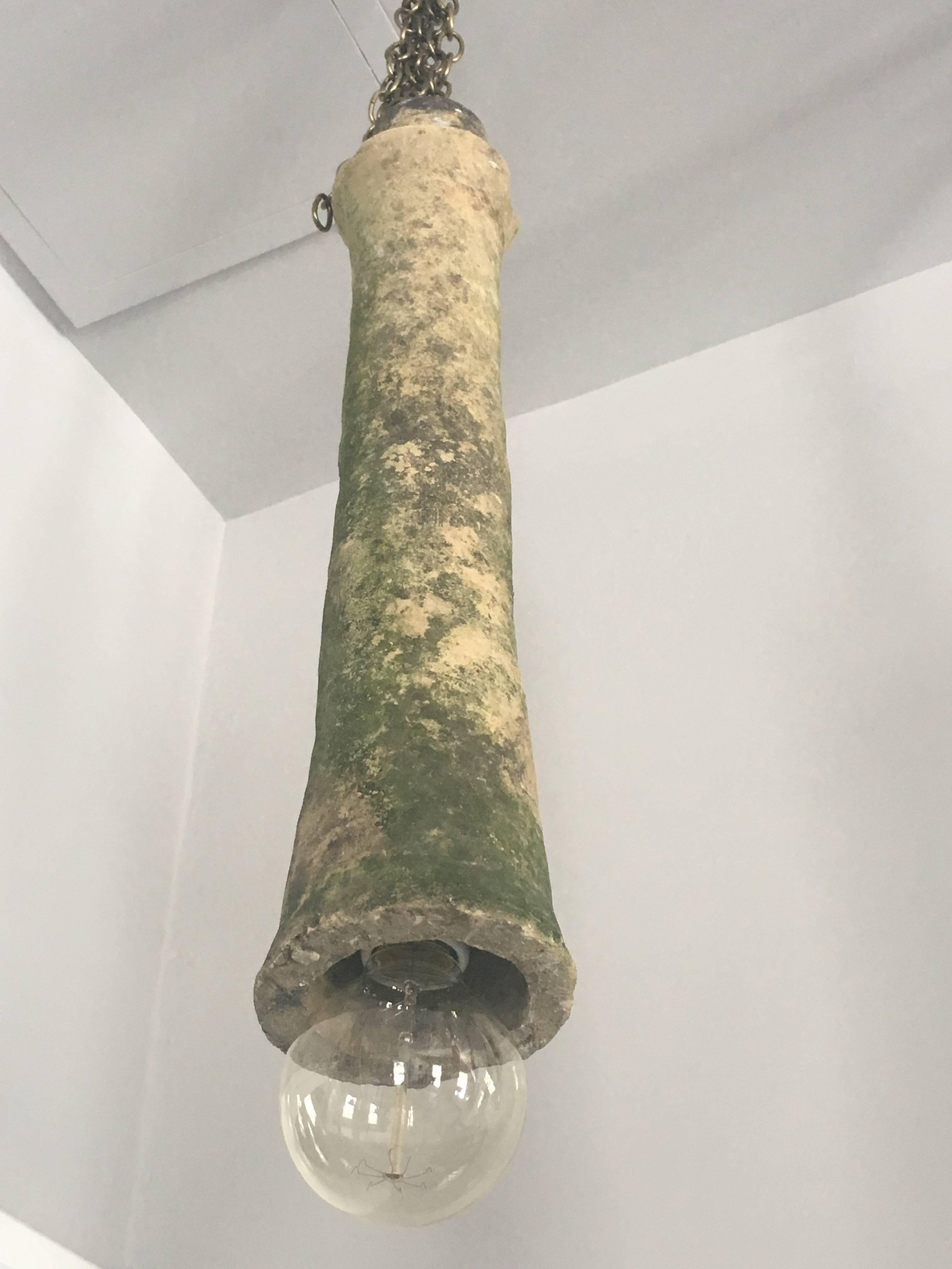 Now here's something you won't see every day! We found these wonderful weathered bisquit terracotta pipes in France and have converted them into hanging pendant lights. In terrific shape with only a few minor chips that do not affect their look or