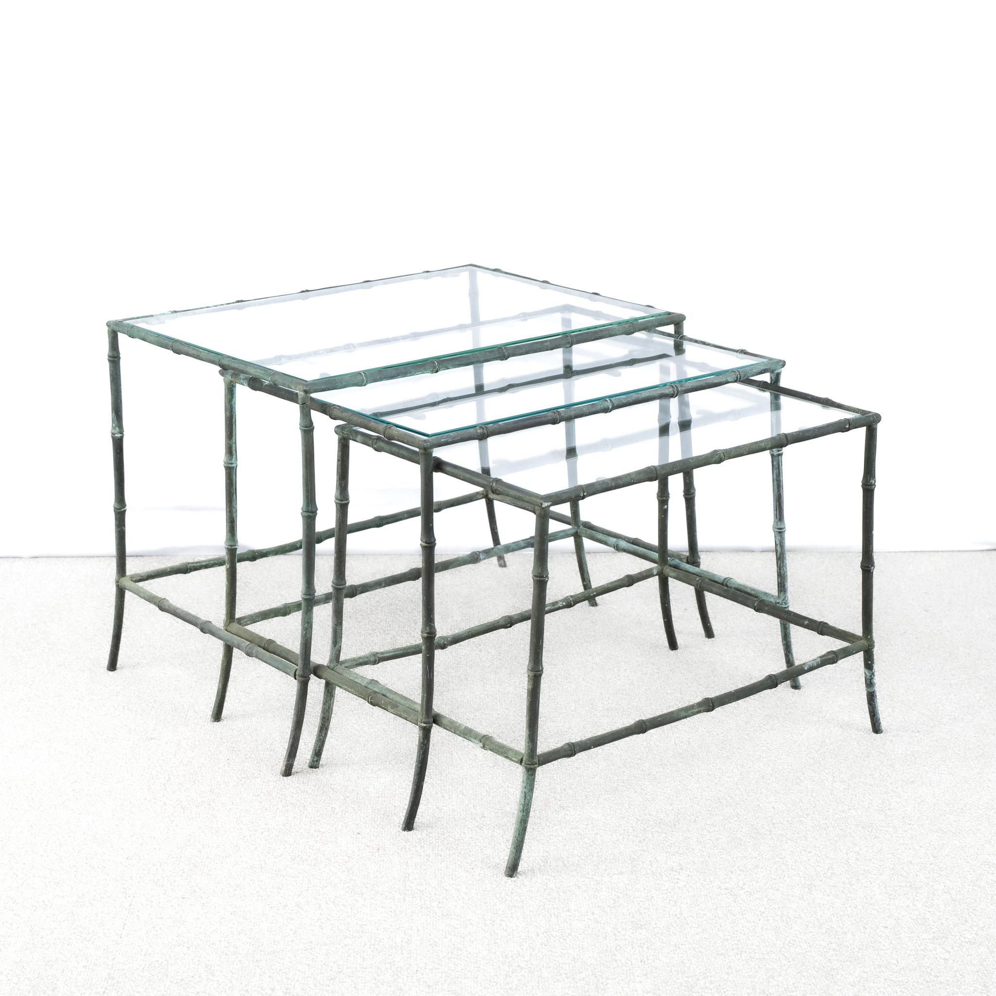 A Rare Nest of Bronze, Faux Bamboo Maison Baguès Tables.
Original verdigris colouration.

France, circa 1920.

Height - 40 cm
Width - 50 cm
Depth - 36 cm
Please message if any further info or photos are required 
SHIPPING
The quotes shown are