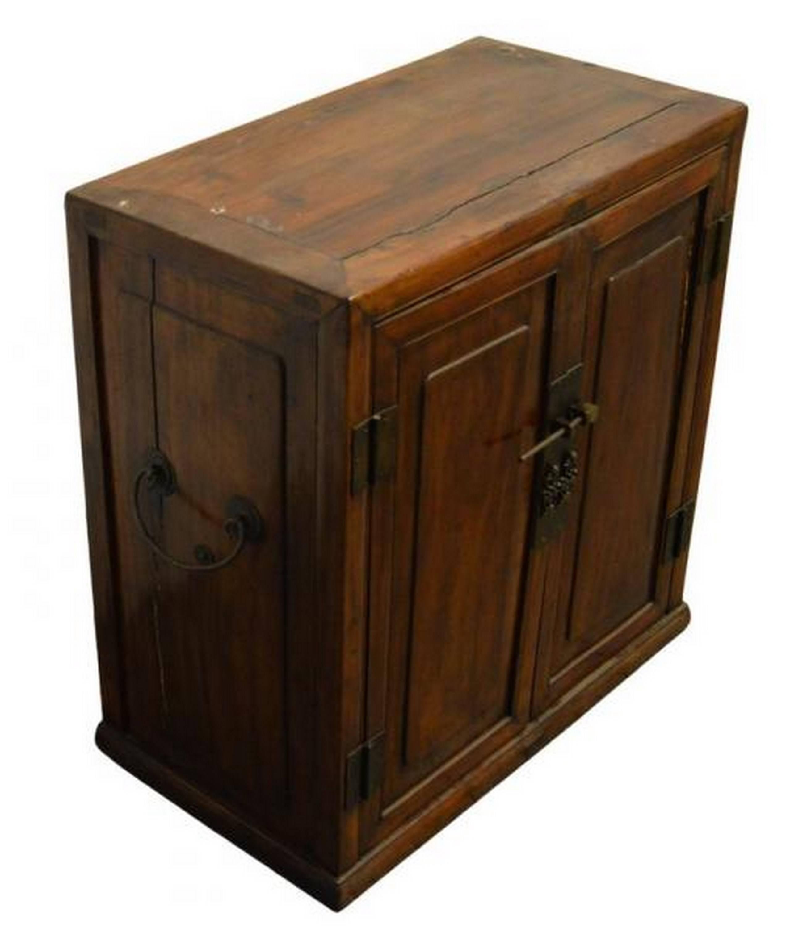 A Chinese side cabinet made with brown lacquered wood and brass hardware from the 1800’s. This side cabinet adopts a refined square shape, livened up by two doors on its front. The cabinet is entirely made of brown lacquered wood. The two doors are