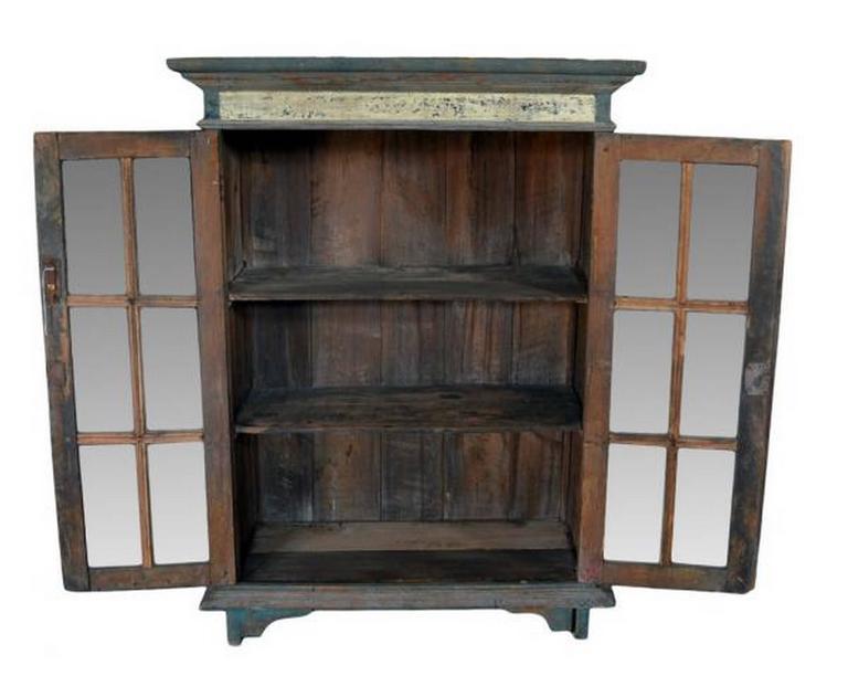 Rustic Hand Carved Goan Indian Cabinet With Glass Doors From The Hand Carved Rustic Goan Indian Cabinet With Glass Doors From The 19th Century