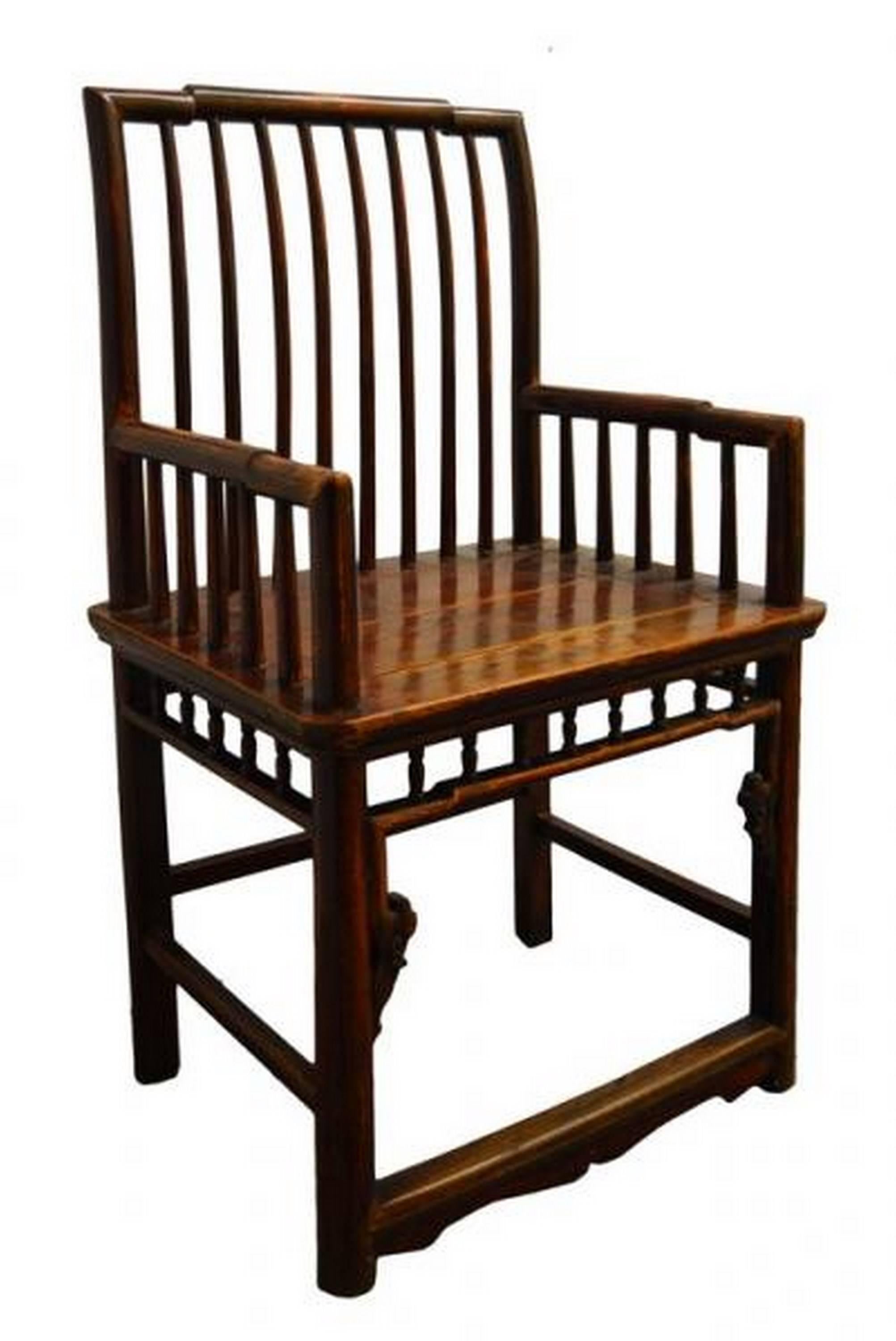 This Chinese 19th century side chair was made with dark brown lacquered wood. This chair features an openwork slatted back and stepped armrests. The rectangular seat is made of varnished planks, connected to a lower stretcher thanks to small wooden