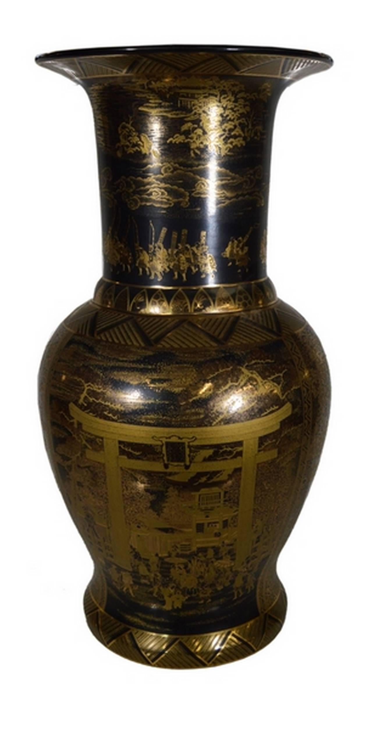 A vintage Chinese vase hand-painted in black and golden on porcelain. This tall porcelain vase showcases golden patterns on a black background. The belly displays a palace scene, probably a court party, nicely painted in two-tone gold. This scene