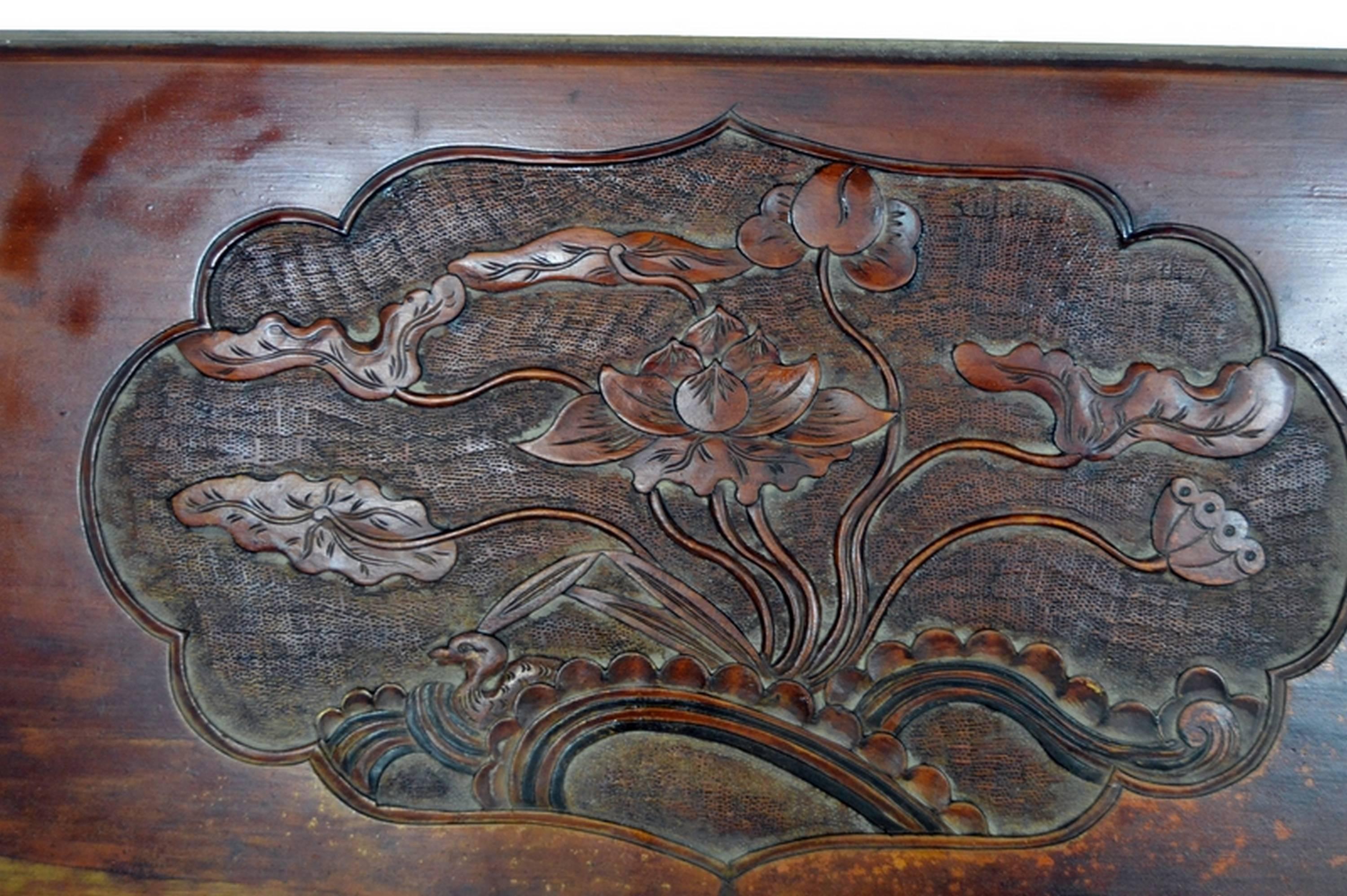 Antique Chinese hand-carved lacquered wooden wall plaque.