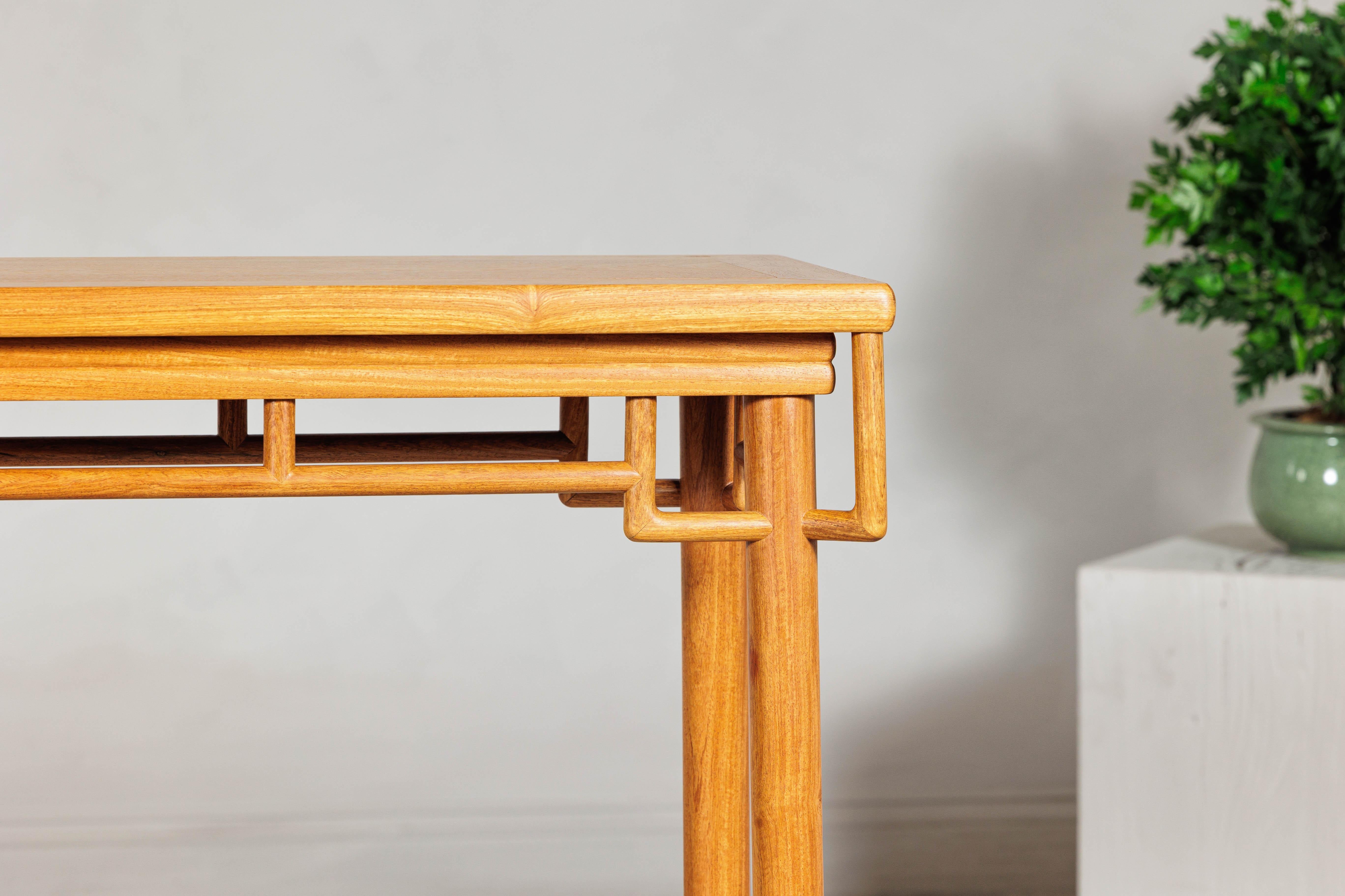 20th Century Elm Wood Console Table with Humpback-Form Stretcher and Openwork Details For Sale