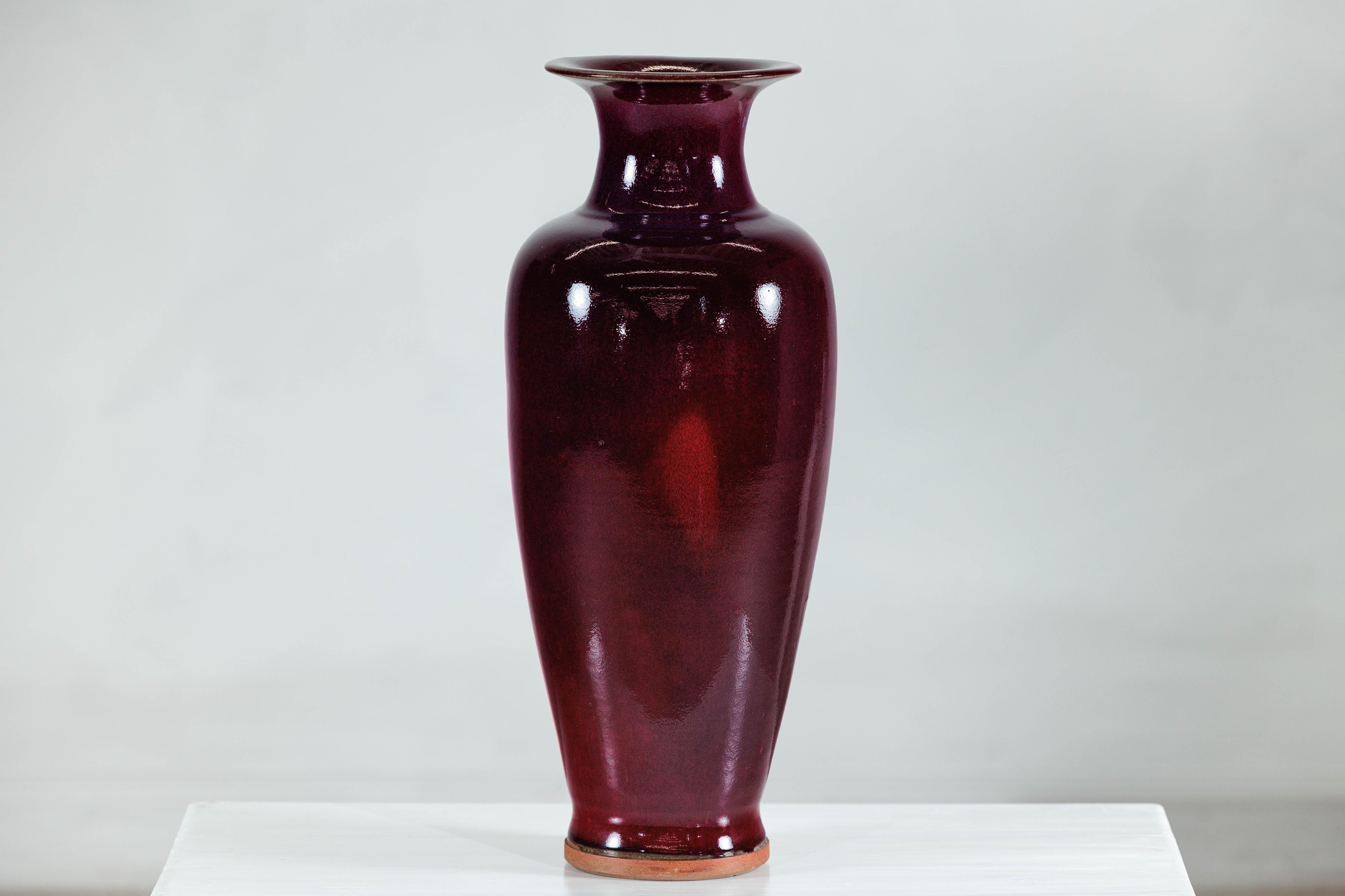 Glazed Tall Stoneware Vase with Deep Oxblood Flambé Glaze For Sale