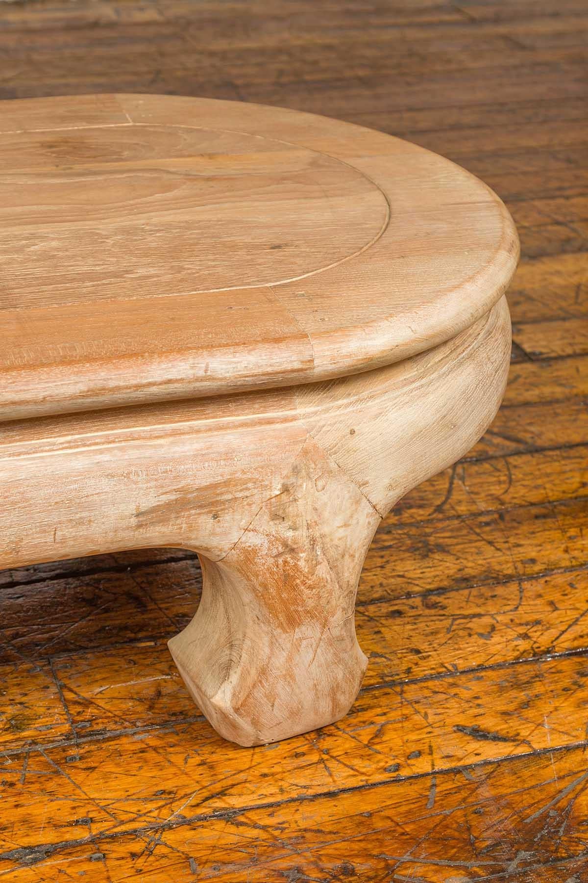 20th Century Vintage Thai Teak Oval Top Coffee Table with Whitewash Finish and Chow Legs For Sale