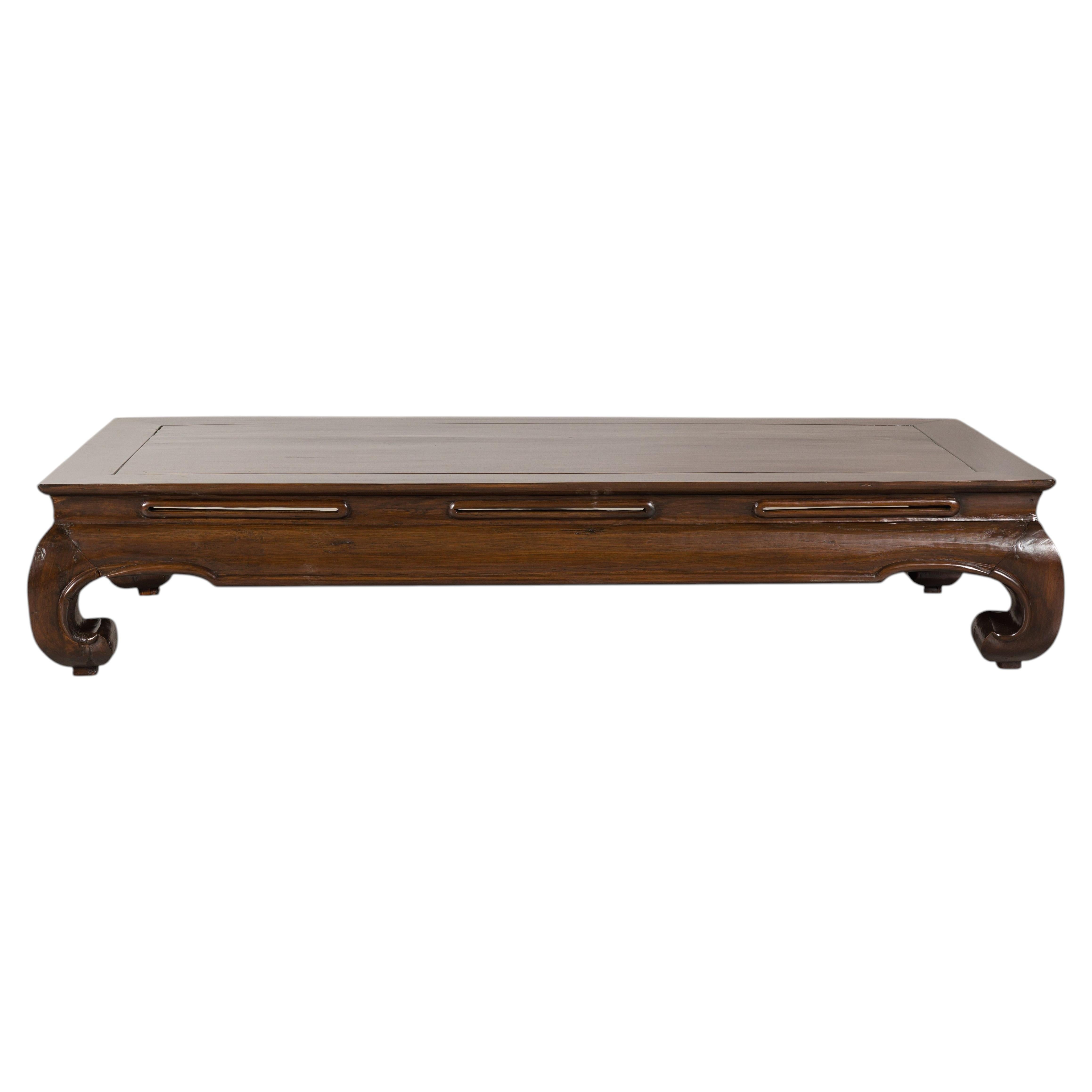 Chinese circa 1900 Elm Low Kang Coffee Table with Scroll Feet and Panel Top For Sale