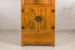 Late 19th Century Chinese Elm Cabinet with Burlwood Panels and Brass Hardware