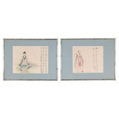 Pair of Antique Japanese Figural Woodblock Prints in Silvered Frames
