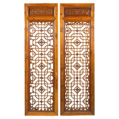 Pair of Antique Chinese Carved Wooden Screen Panels with Geometric Fretwork