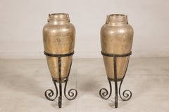 Pair of Greco-Roman Style Hammered Brass Amphorae on Custom Iron Stands