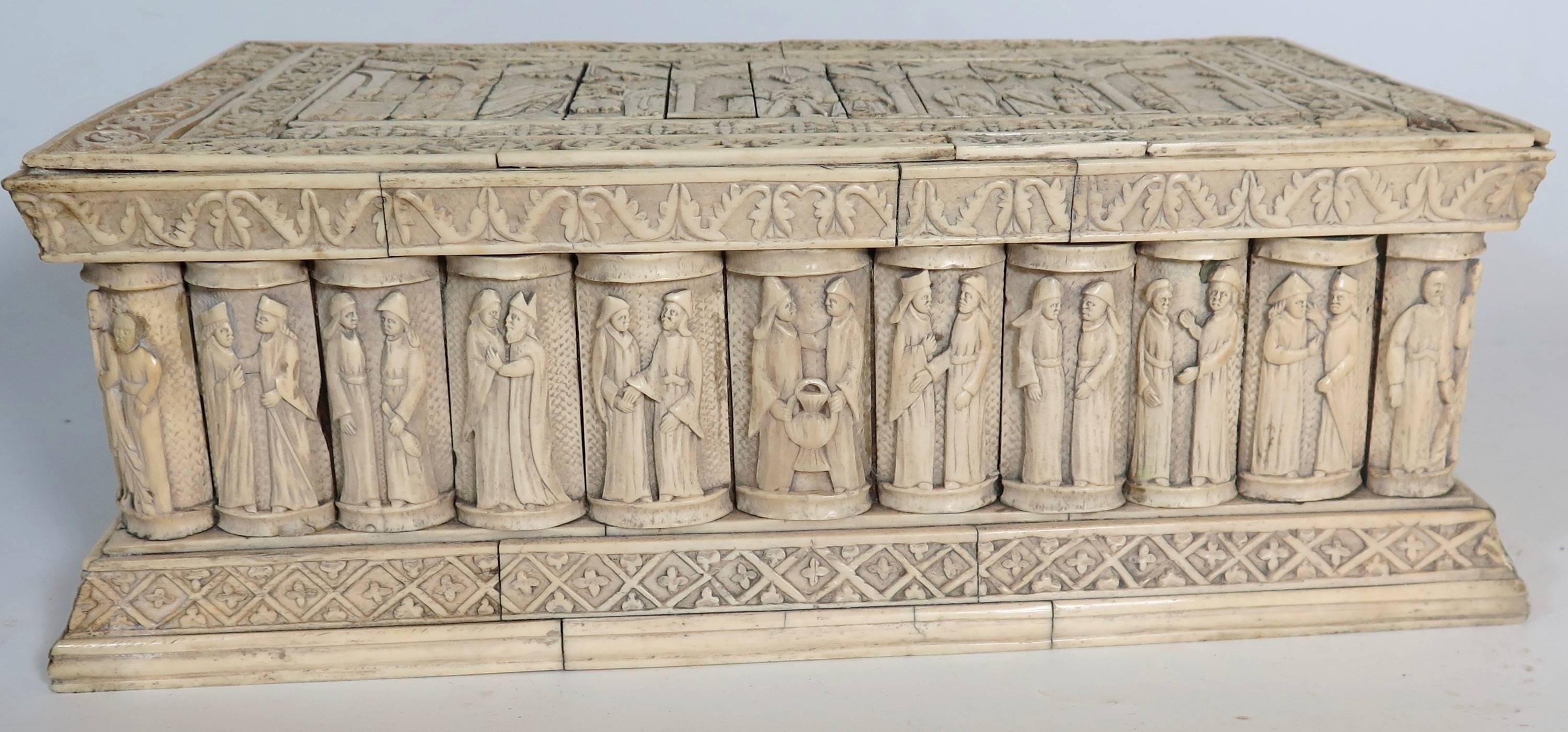 Exceptional Italian Embriachi marriage casket. The top slides from left to right. Similar caskets are seen in museums throughout the world. The box is composed of wood with carved bone pieces attached to surface.
Various Christian themes adorn the