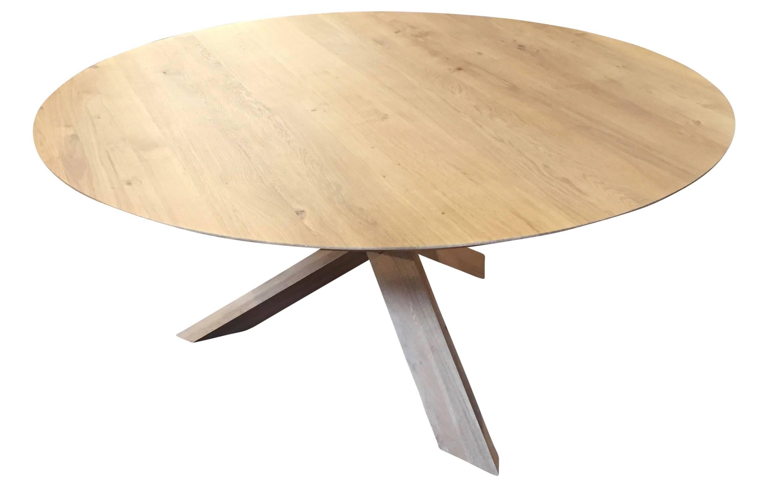 Contemporary White Oak round dining table with three legs. Custom Orders and sizes available. 
This table can be made in Walnut, Oak or Alder

Custom Orders take 6-8 weeks