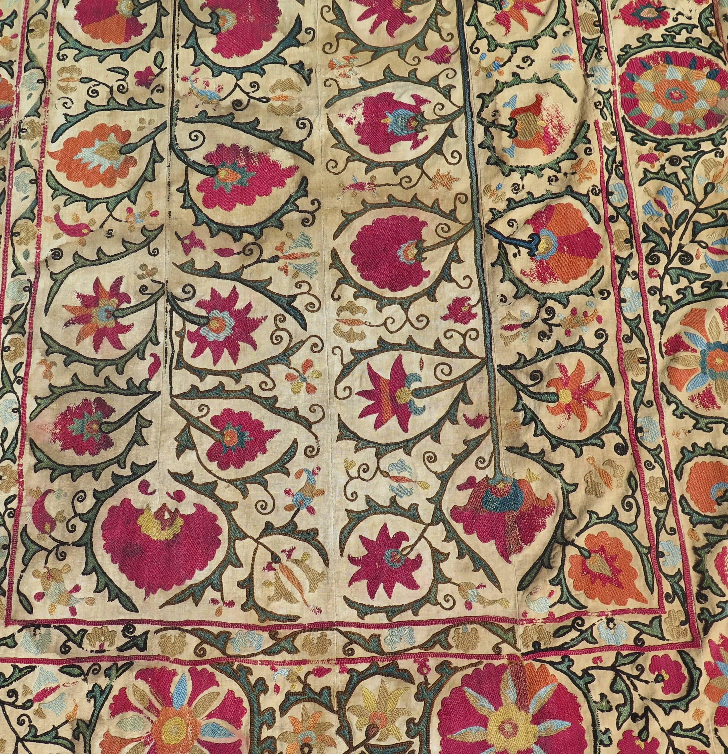 Bold flowers and vines is attributed to the city Shahrisabz, Uzbekistan. Incredible, rare example of early textile art.