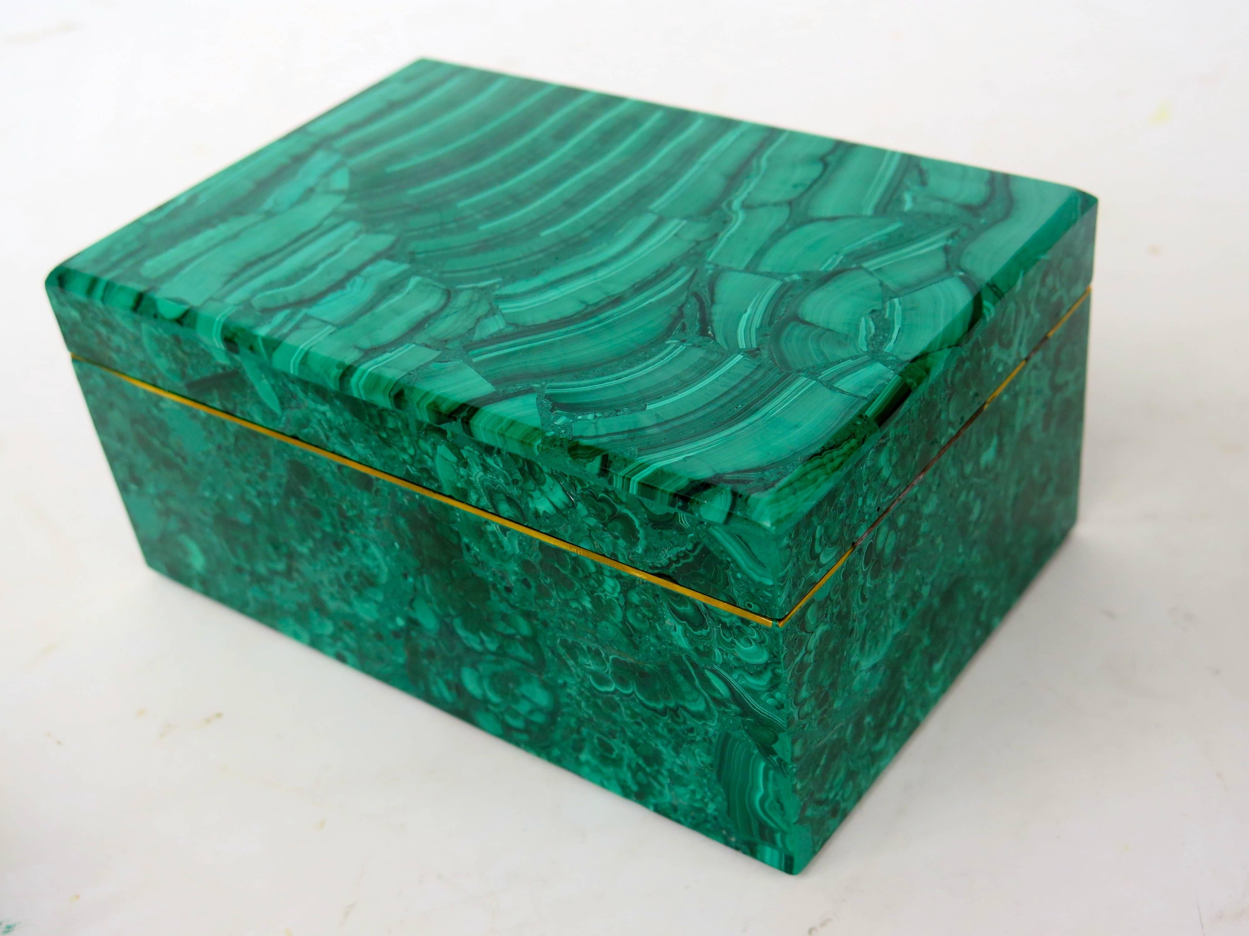 Recently purchased collection of beautiful malachite boxes, two with brass trim. They are priced as a group, but can be purchased separately.
Large 6.25" W x 4.25" D x 3" T.
Medium 5.5" x 3.75" x 2.75".
Hex